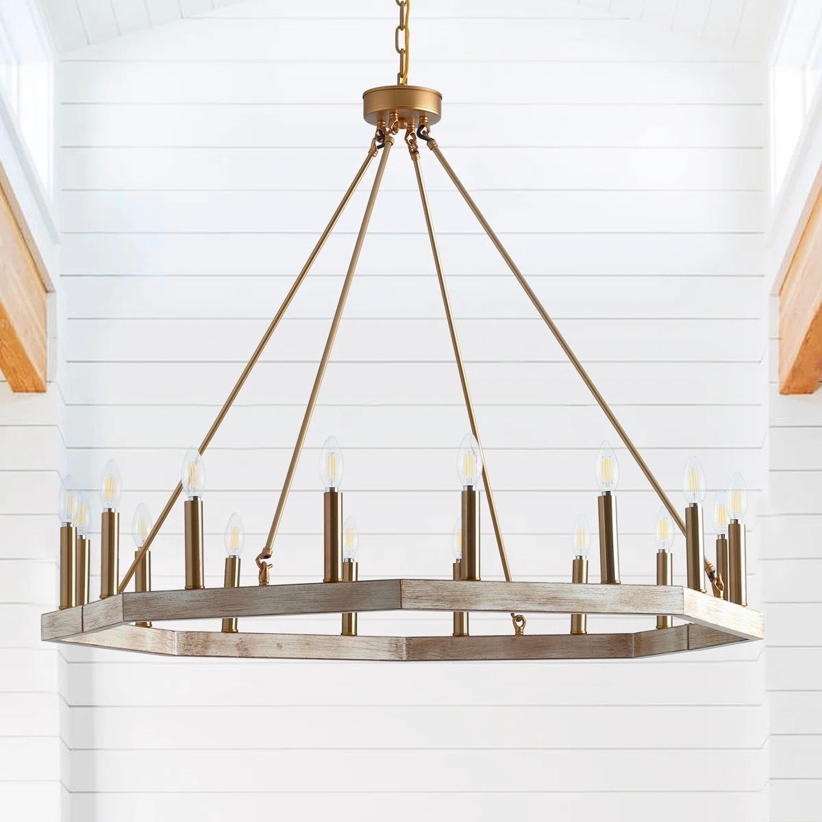 Inspired by European classic estate interiors, this 16-light adjustable wheel-shaped chandelier introduces timeless structure with a refined architectural silhouette. The circular form creates balance and symmetry while delivering a dramatic yet elegant lighting statement. ON SALE and under $300.

Keywords:

* wheel chandelier
* farmhouse chandelier
* 16 light chandelier
* adjustable chandelier
* classic chandelier
* round chandelier
* modern farmhouse lighting
* dining room chandelier
* high ceiling chandelier
* statement ceiling light
* rustic modern lighting
* foyer chandelier
* architectural lighting
* open concept lighting
* estate style chandelier
* transitional lighting fixture
* luxury farmhouse decor

#LTKHome #LTKSaleAlert #LTKSeasonal