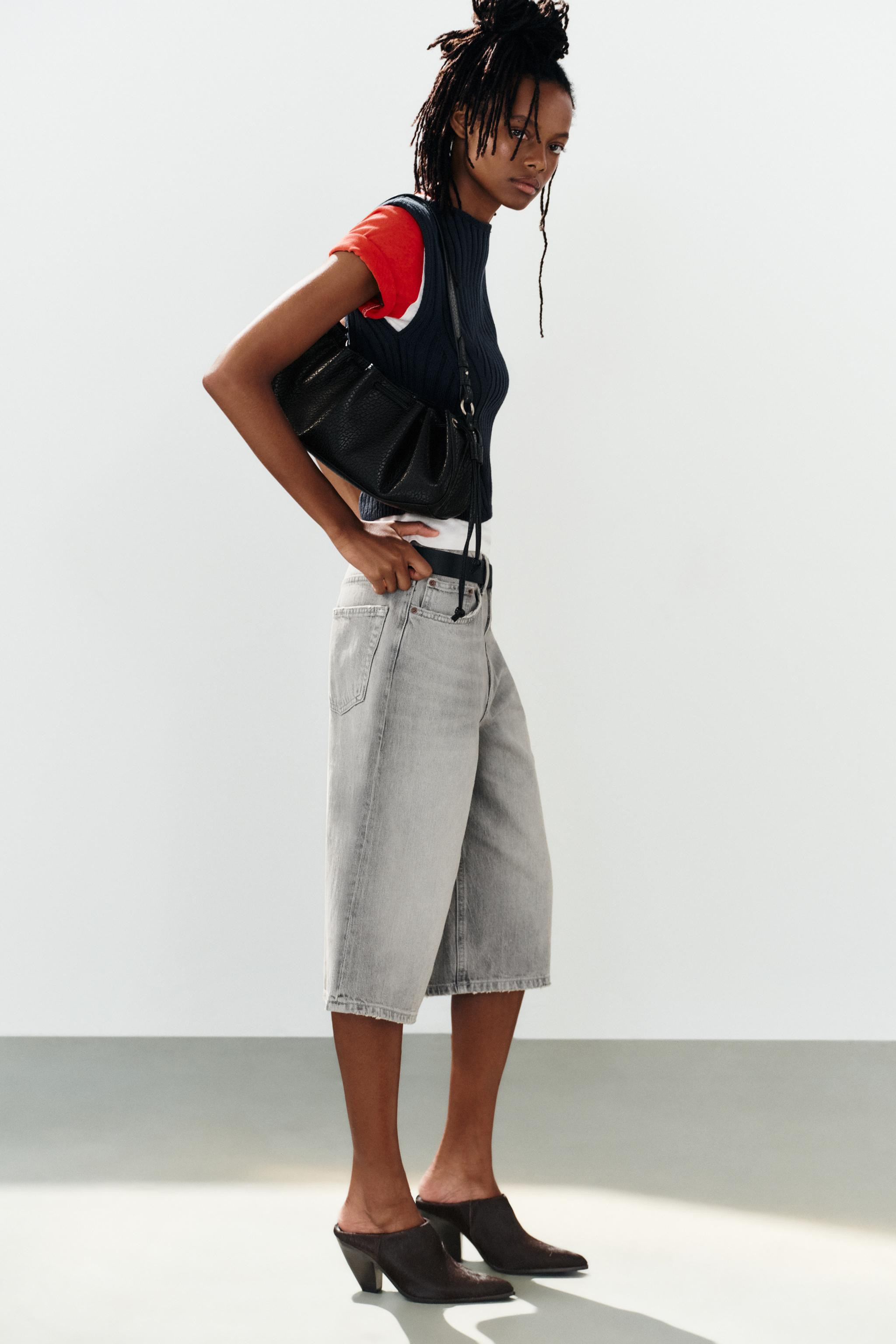 Ribbed knit top with a boat neckline and sleeveless design. | Zara US