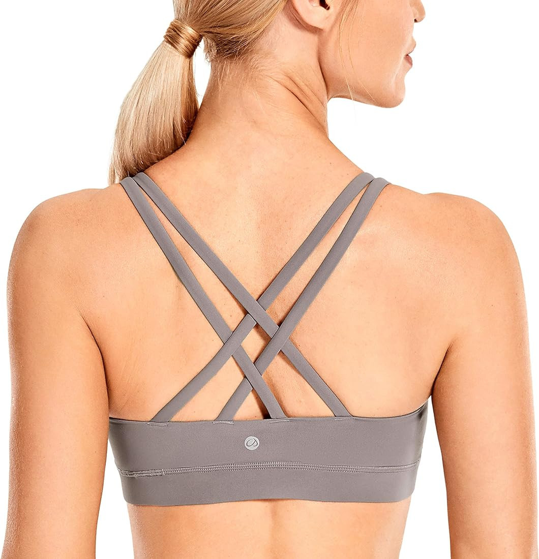 CRZ YOGA Women's Strappy Sports Bras Fitness Workout Padded Yoga Bra Criss Cross Back | Amazon (US)