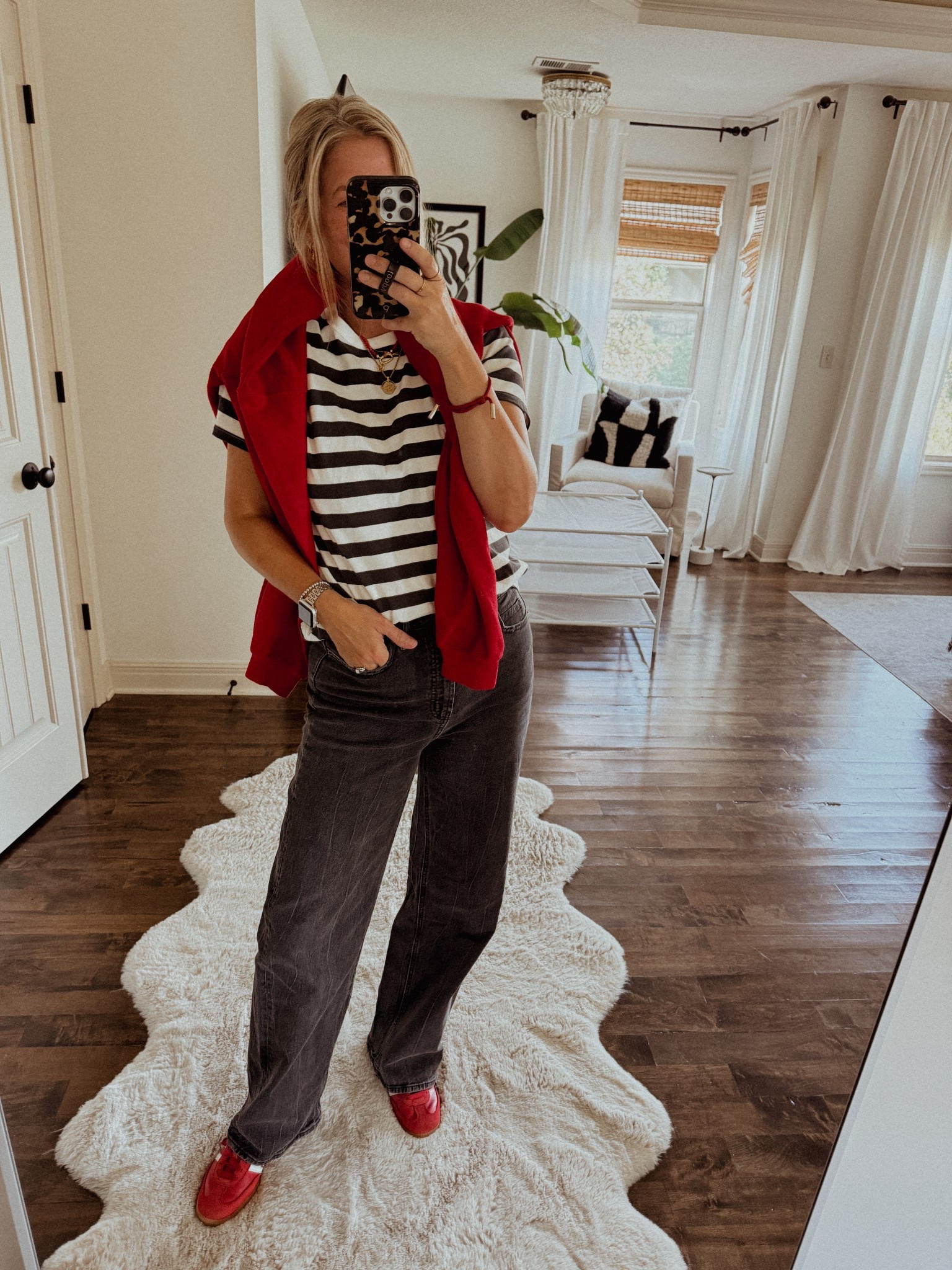 Black jeans, striped tee, red sneakers, game day outfit 

#LTKSaleAlert #LTKOver40 #LTKFindsUnder50