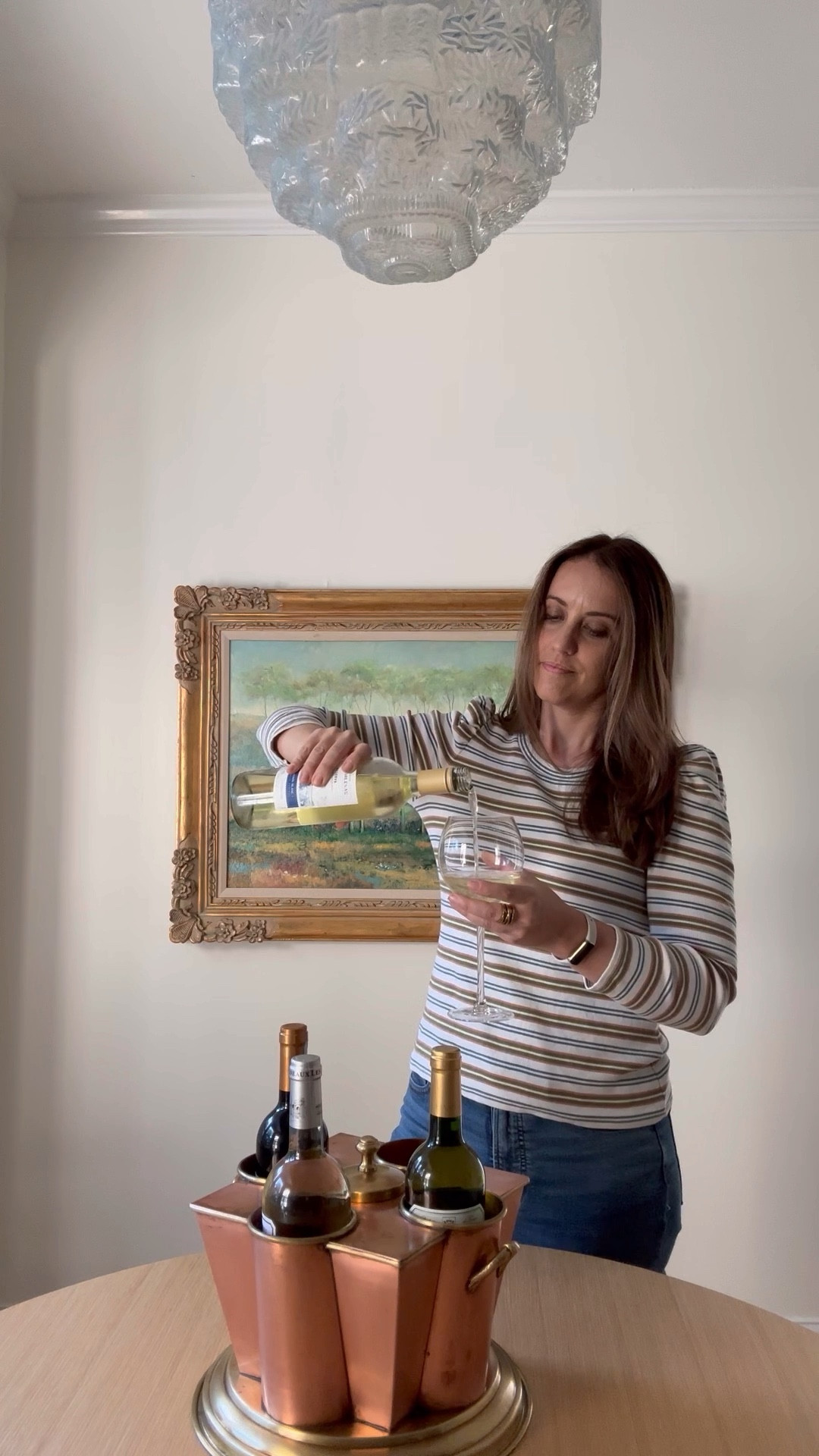 One of my coolest estate sale finds is this vintage copper wine cooler. It holds 4 bottles of wine with an ice chiller in the center. Complete with handles and trimmed in brass. Who says coolers can’t be pretty?! Rounding up some similar options for you to shop from.

#LTKHome #LTKVideo
