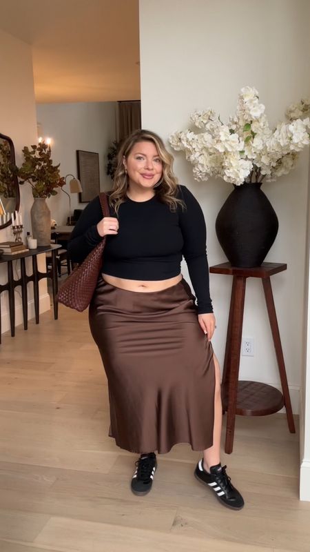 Styling sneakers with skirts is one of my fav ways to feel chic and comfy! Wearing size large in skirt and size large in top.

Spring outfit, sneakers, midsize 

#LTKmidsize #LTKstyletip