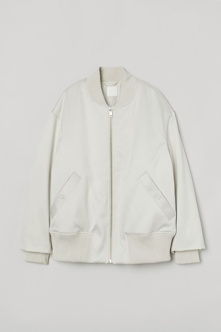 Slightly longer, lightly padded bomber jacket in satin made from recycled polyester. Ribbed, stan... | H&M (US + CA)