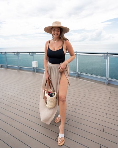 Beach outfit idea: black high cut one piece swimsuit, Amazon cover up, sunhat, and beach tote 

#beachoutfit #blackswimsuit #amazoncoverup #beachlook 

#LTKstyletip #LTKswim #LTKtravel