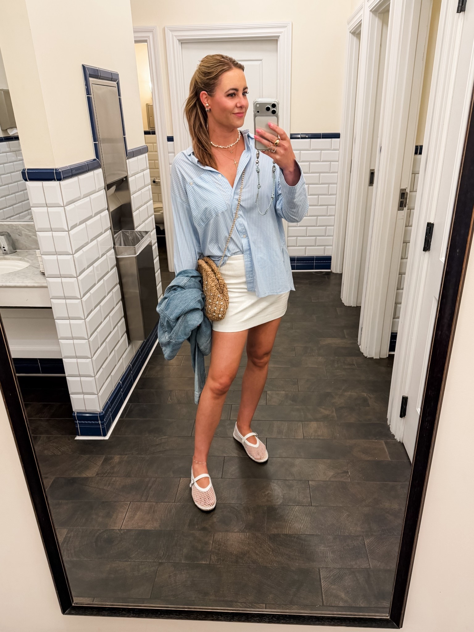 Date night look - oversized menswear-inspired button down with a faux leather mini ftw.