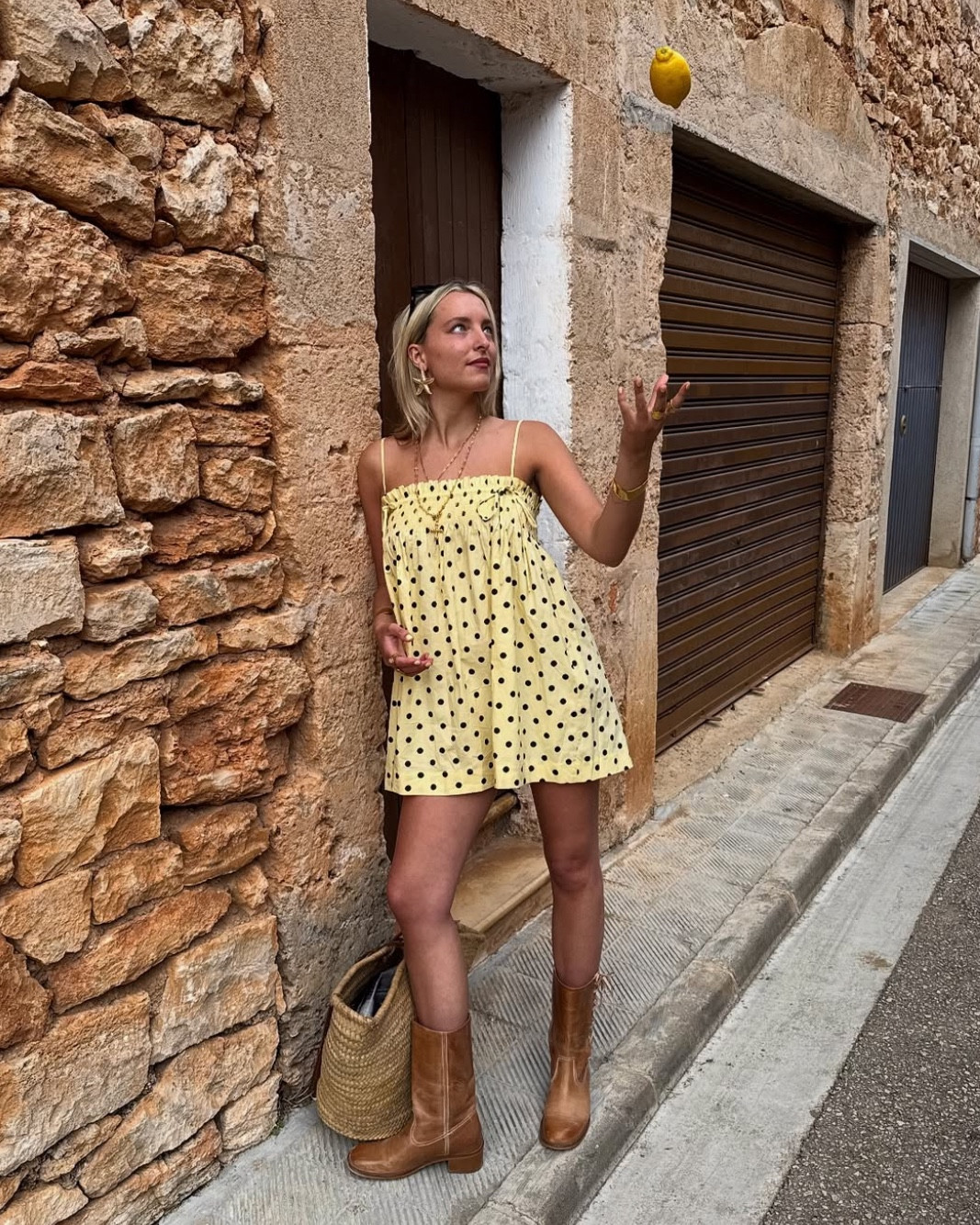 yellow polka dot mini dress and brown lace detail boots 