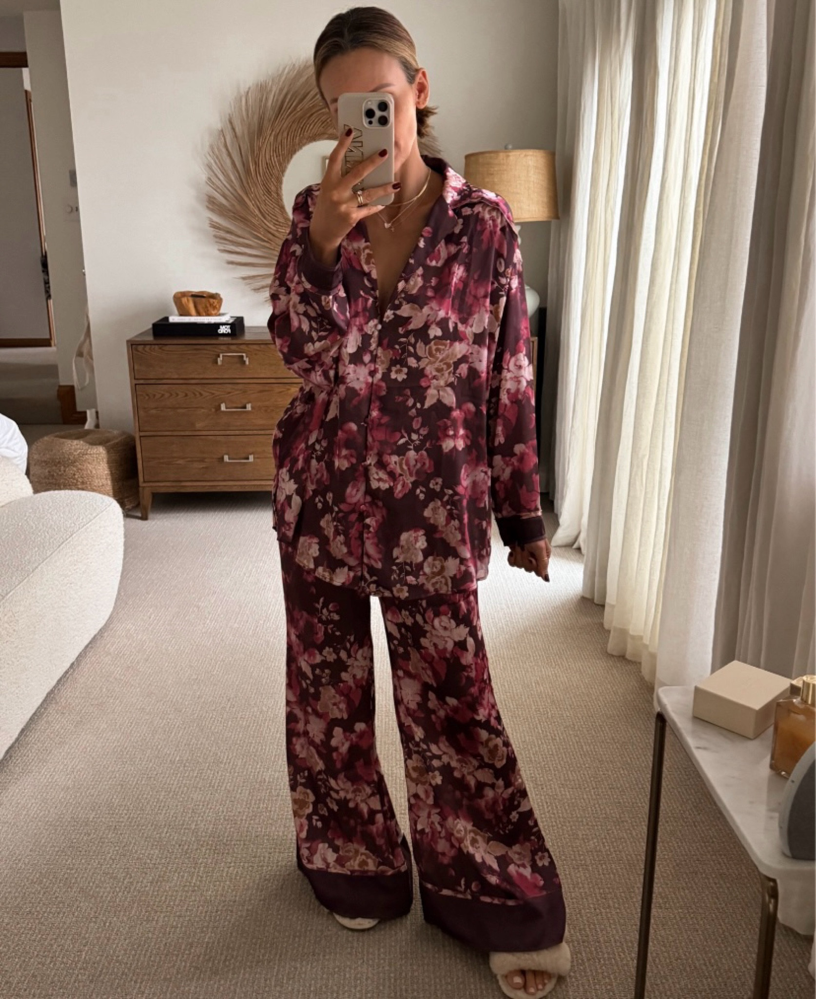 If you don’t love the concept of Christmas pajamas (there’s not enough time to wear them!) this pajama set would be my top rec. I’ve had them for over a year now and they’ve worn and washed so well. They’re perfectly oversized, comfy, and breathable — three sleep-approved musts! I went with a size XS and they still fit plenty roomy. I was skeptical with the print being so bold but I actually love it, especially during cold and dreary winter days. The matching set also comes in other prints and I think this would be such a great gift idea for the holidays! I’m also linking my slip-on UGG slippers (along with some other popular picks) below. 

#LTKFindsUnder100 #LTKGiftGuide #LTKHoliday