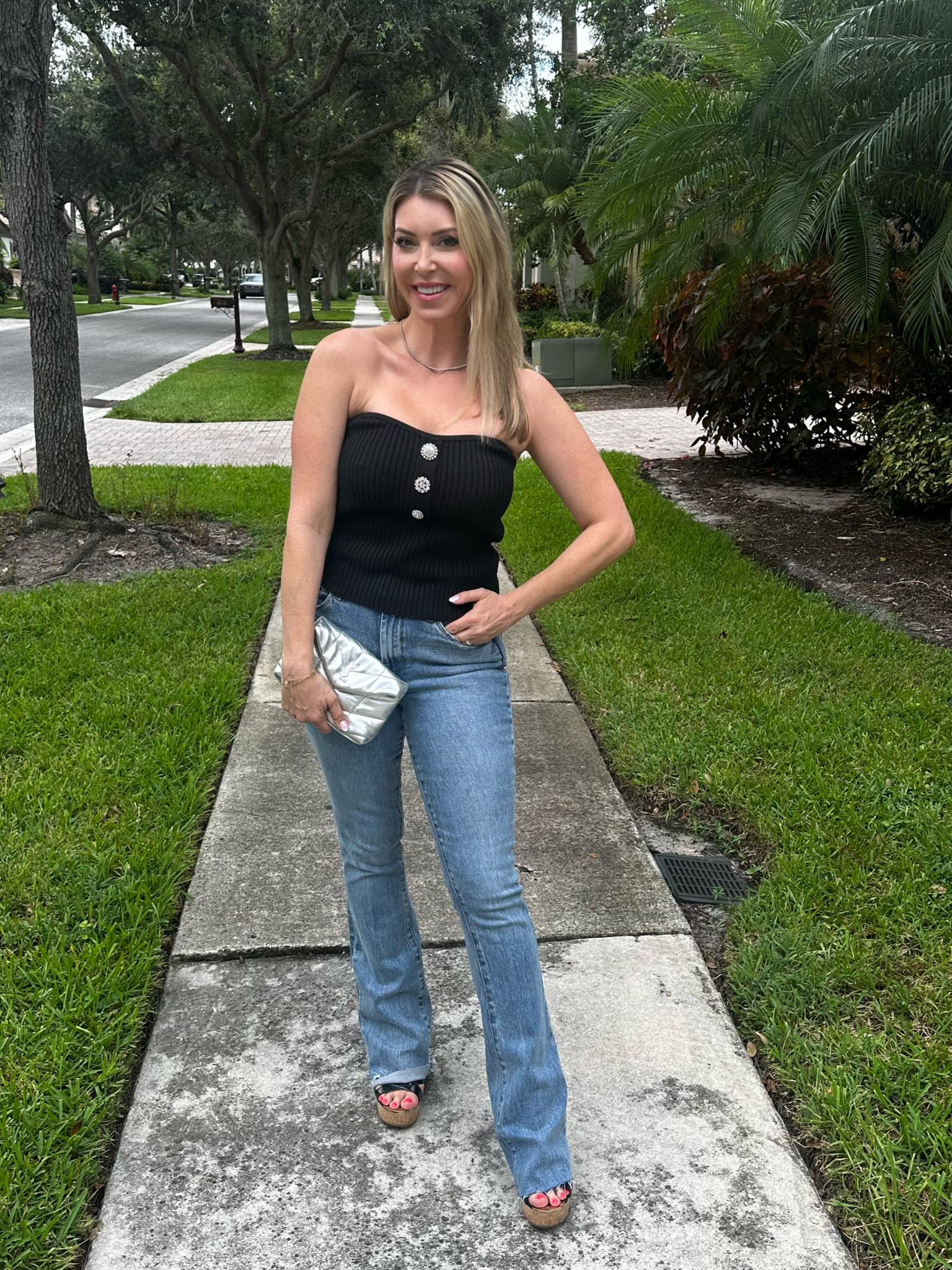 Date night fit check! New favorite jeans wearing a size 27. They are long.., so if you are short you may need to cut them. I’m wearing them with my Jimmy Choo wedges so it was ok. Top is a small. And bag is a perfect little clutch. 

#LTKover40 #LTKFind #LTKstyletip