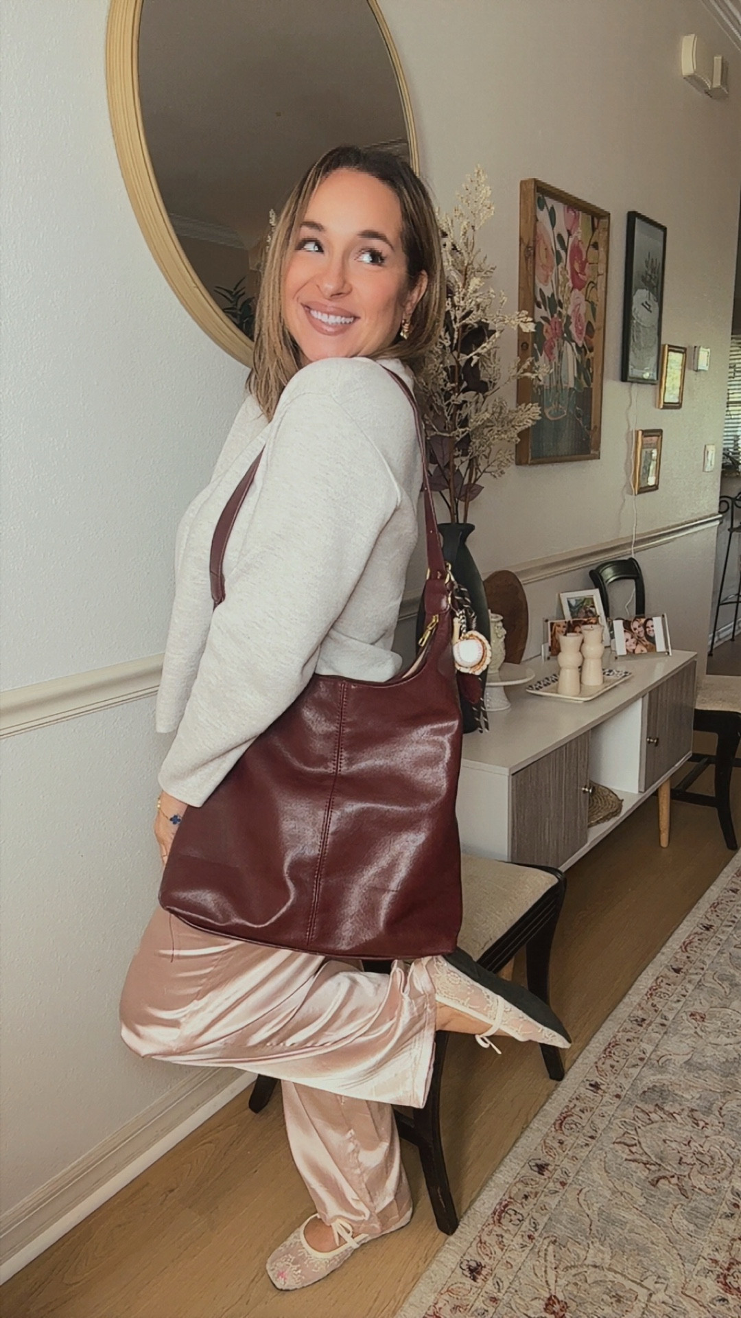 Comfort meets chic 🩷
My go-to errand outfit:
✨ Silk pants – Amazon
✨ Cozy sweater – Zara
✨ Burgundy bag + slippers – Amazon
Linked everything for you on my LTK 💻 #LTKfashion #LTKfallstyle #LTKmomstyle
Sizing reference:
Height: 5’2”
Weight: 135 lbs
Bust: 34D
Waist: 27” 
Top size: Medium
Bottom size: 6 

