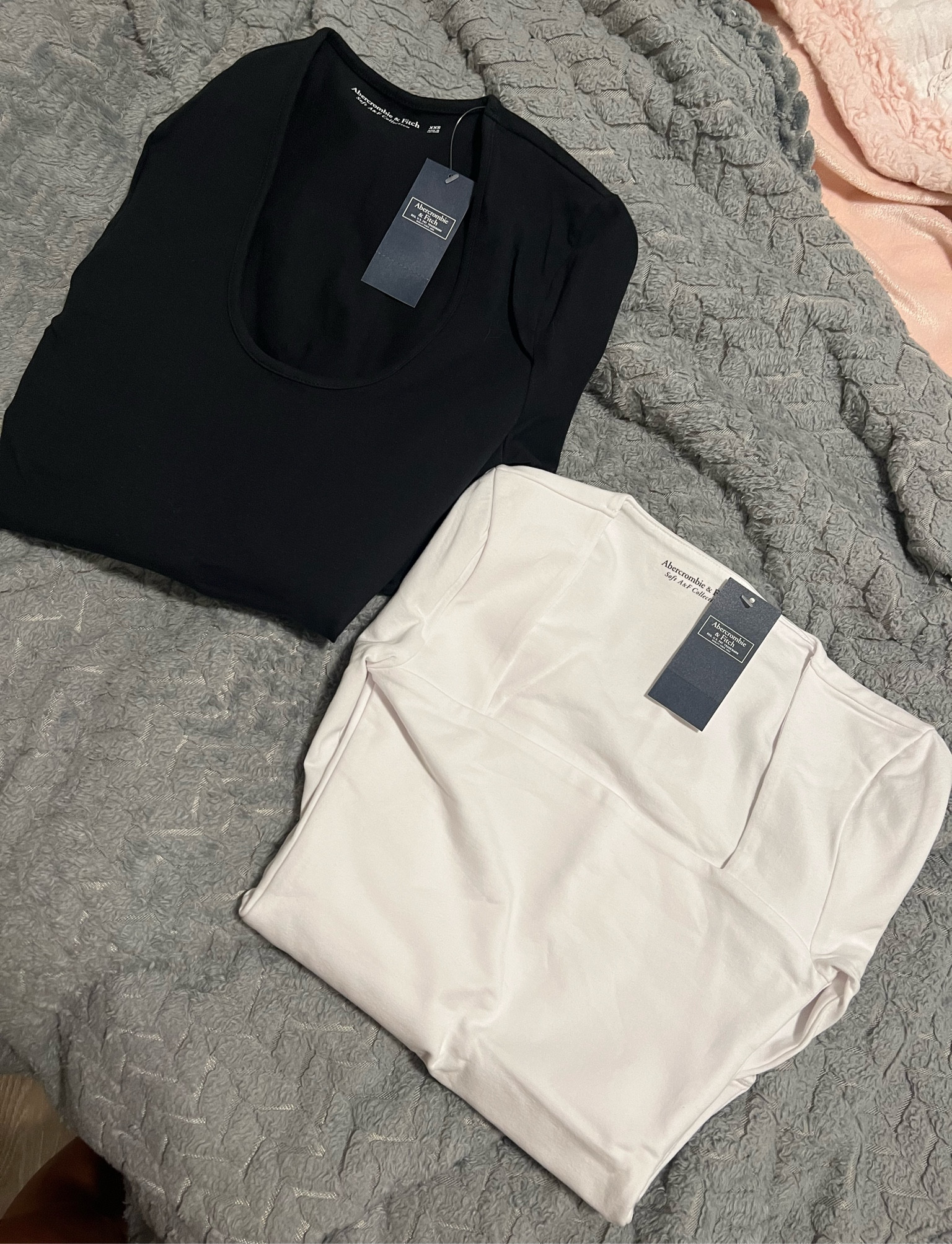 Black & white long sleeve body suits from Abercombie!