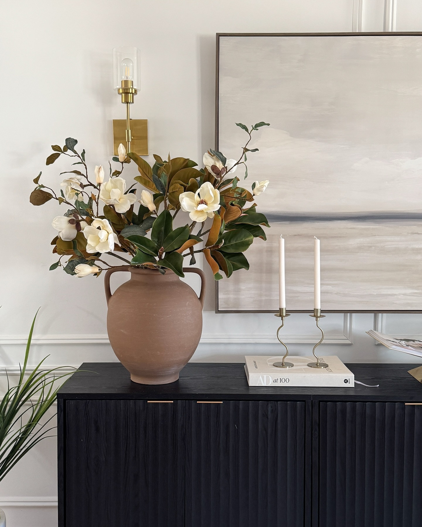 Gave our entryway a little refresh, and I’m loving how it all came together! 🌿



Swapped in some magnolia stems, added soft candlelight, and kept things neutral and cozy. Simple changes, but they make such a difference!
.
.
.
.
#entrywaydecor #afloral #modernorganic #entrywayrefresh #styledspaces #cozyhomedecor

#LTKStyleTip #LTKSeasonal #LTKHome