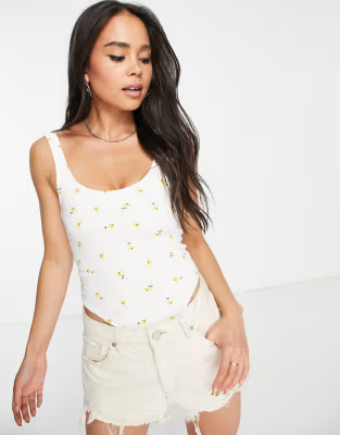 ASOS DESIGN rib bodysuit in yellow delicate floral | ASOS (Global)