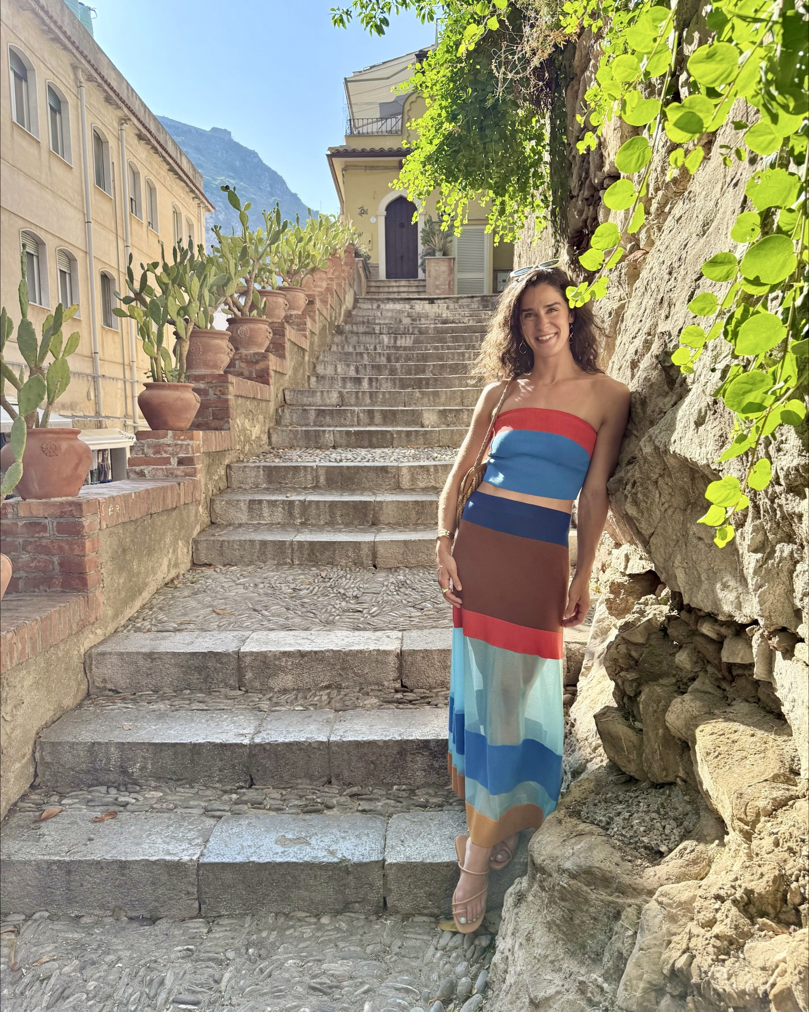 Love this fun set. Comfortable and easy. Runs TTS though could maybe size down in the skirt (wearing a small in both)

These are the Amazon sandals. They were comfy for walking Taormina (very hilly town). I also have the reformation version in black. Both a great- Amazon a little better for a wider food and reformation more narrow. Both run TTS wearing a 9