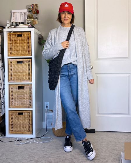 Winter outfit idea for an indoor market where I didn’t need a heavy coat. This long cardigan is so soft and cozy and adds a warm layer. I’m 5’ 7 wearing my usual size S.
Also wearing S in the crewneck sweater, it’s a roomy fit.
Jeans fit tts and are so versatile!
Converse fit big, I always go down 1/2 size.
Also linked my bag and cap from Amazon.


#LTKstyletip #LTKshoecrush #LTKitbag