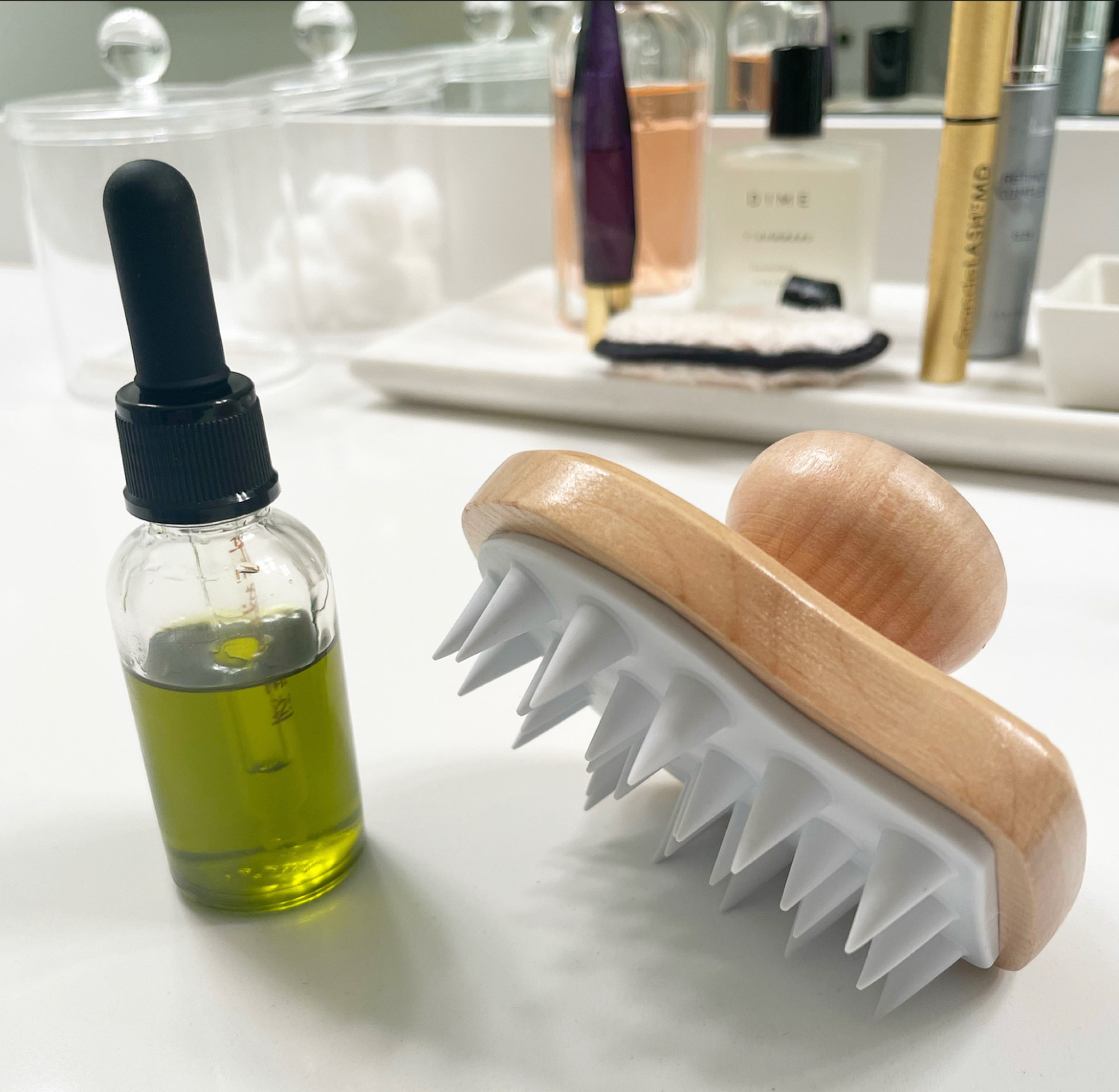All about hair care in 2023 🫶🏼
The oil is my own rosemary oil that I made using an easy recipe I found online. Oil dispensers and scalp massager are both from Amazon. 🤎 

After having covid in 2021 I started to experience a lot of hair loss and breakage. I’ve read a lot about rosemary oil and it’s benefits for your scalp and hair health so I am trying it! Can’t say if it works yet but will post more after I keep using it for a while! So far I’m on use five (i oil my scalp and let it sit for about an hour on my hair wash days which is anywhere from every 3-4 days depending on plans). So far I will say my scalp feels clean and refreshed and my dandruff (which was really bad btw has been minimal to none) I can compare it to the way your scalp feels after a hair appointment! I love this scalp massager for washing because I feel like it really helps give you a deep clean every time! For oiling it’s the best because it disperses the oil all throughout your scalp evenly. Without it I felt like there was oil in some spots but never evenly throughout. Highly recommend if you’re working on your locks like me! ☝🏼

#LTKbeauty #LTKFind