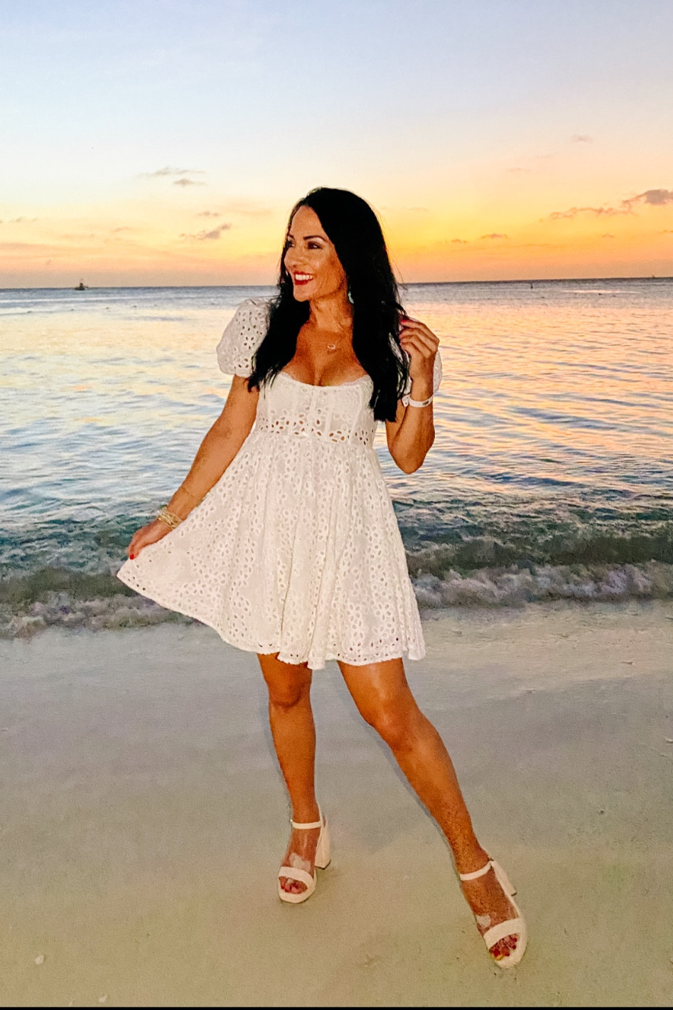 White puff shoulder eyelet dress 

#LTKstyletip #LTKtravel #LTKwedding