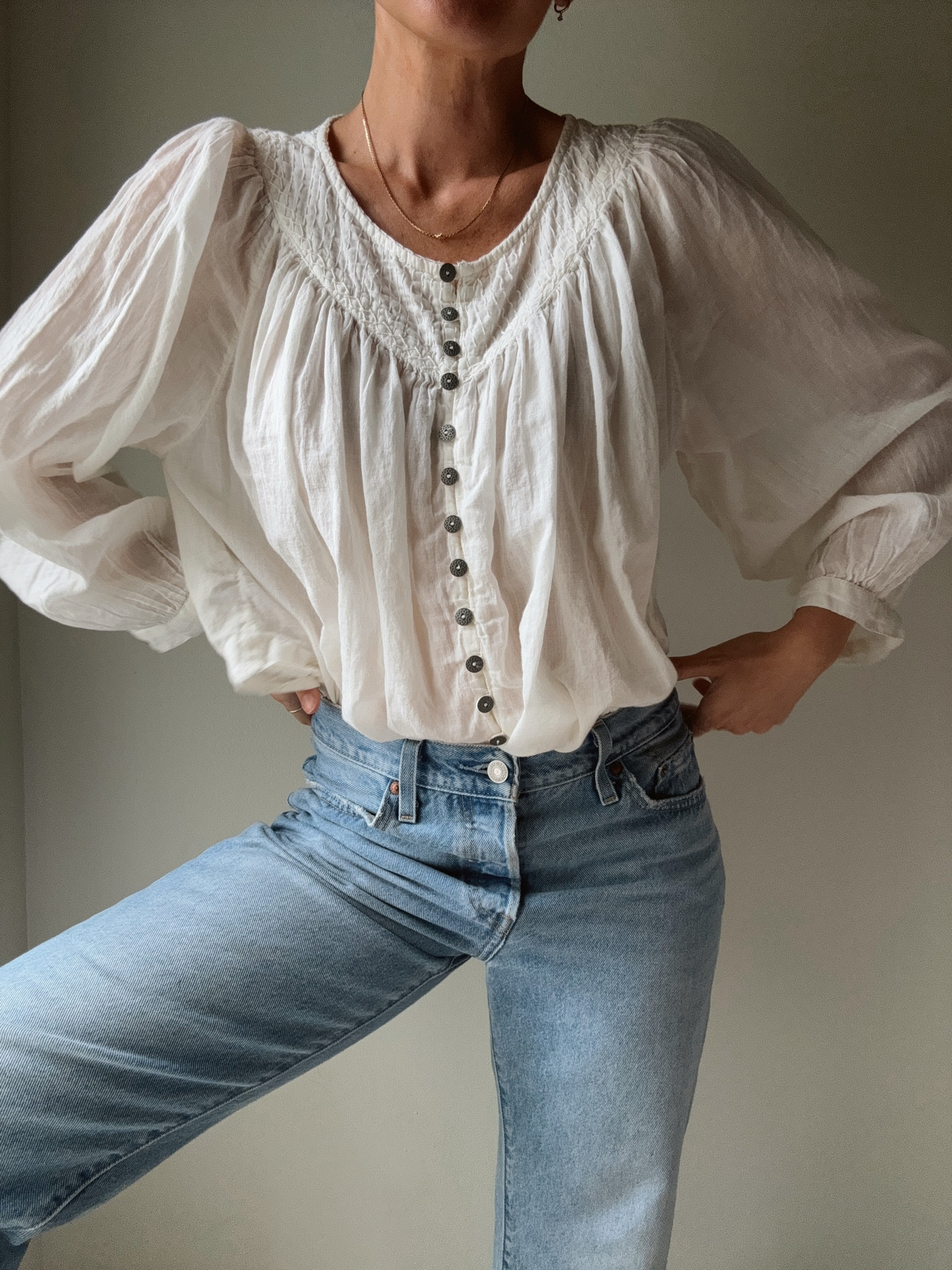 Levi’s 501 90’s and a free people white breezy blouse
