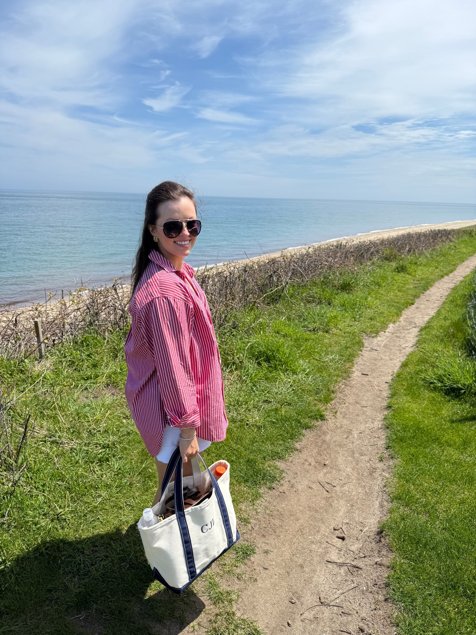 
What to wear in Nantucket - Sconset Bluff Walk
New England summer
Vacation outfit idea 

Nantucket casual day outfit 
Nantucket dinner outfit 
Size: I’m wearing a Petite Small in the button up, Boat & Tote is the Medium size 

#LTKTravel
