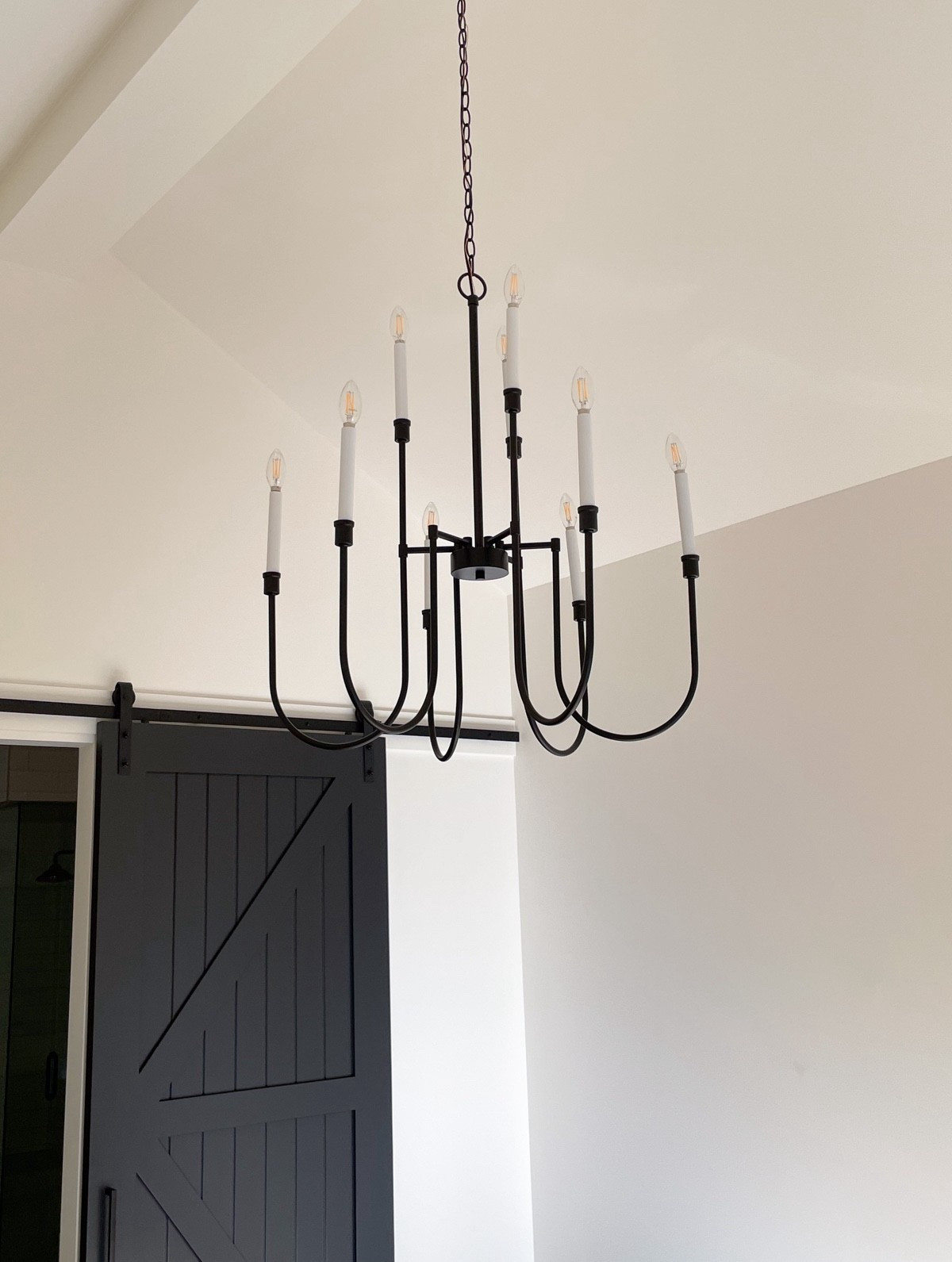 Tux 9-Light Black Chandelier: A budget-friendly, transitional light fixture for vaulted ceilings or larger rooms. Works perfectly in this modern farmhouse bedroom.

#LTKStyleTip 

#LTKHome #LTKSaleAlert