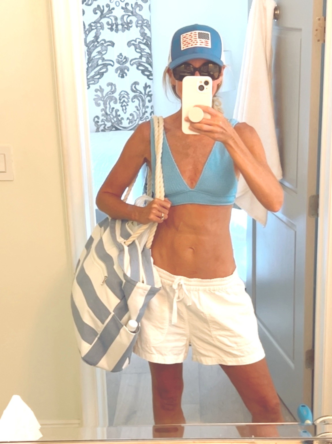 I got this beach bag for our spring break trip knowing I would use it all summer. It’s durable, has lots of pockets, and one is an isolated zipper pocket to keep lip glosses and sunscreen is cool and is super cute!

#LTKSwim #LTKmomlife #LTKOver40