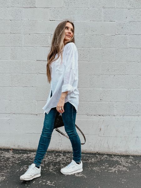 Perfect spring oversized button down is back in stock! Lightweight and doubles as the cutest swim coverup. My face skinny jeans from Good American are 25% off with code: SAVE25. Reebok classic sneakers also on sale for spring 🙌🏼

#LTKfindsunder50 #LTKshoecrush #LTKsalealert