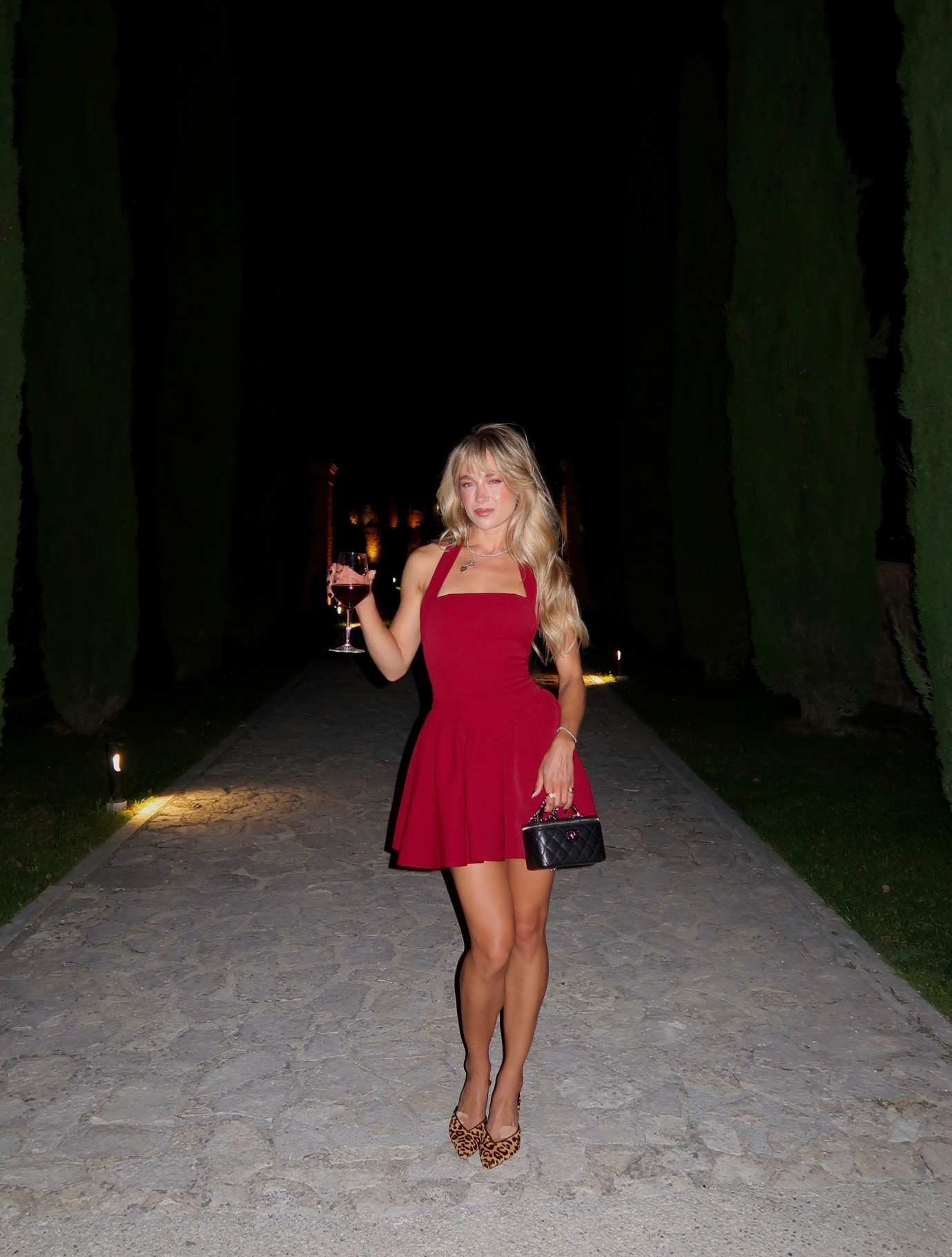 Little red dress with a little glass of red wine