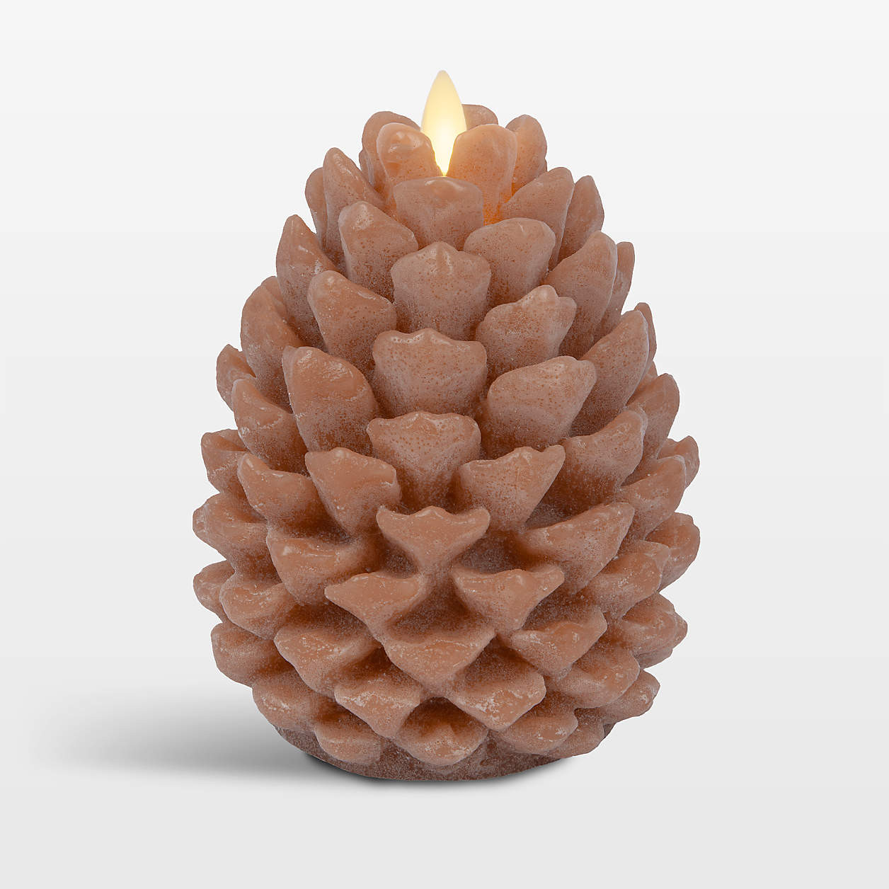 Flicker Flameless Small Caramel Cafe Pinecone 4" | Crate & Barrel | Crate & Barrel