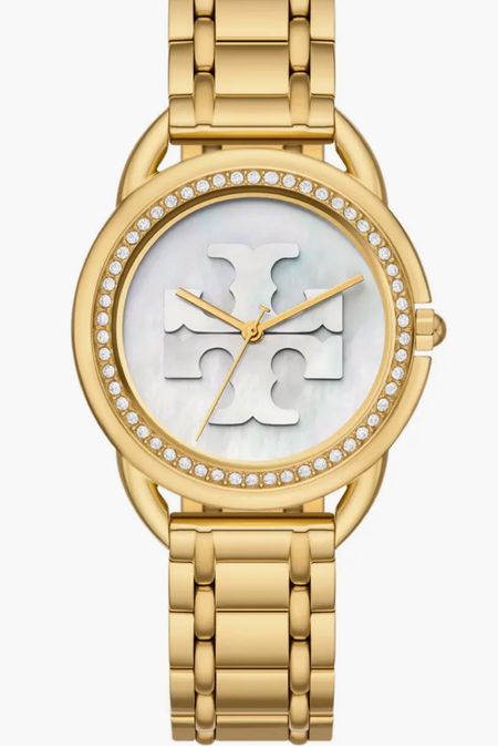 Tory Burch The Miller Glitz Bracelet Watch

Sparkling cubic zirconia light up the bezel on this gleaming watch featuring a mother-of-pearl dial with an oversized Double-T logo lending signature style

#LTKGiftGuide #LTKStyleTip #LTKWorkwear