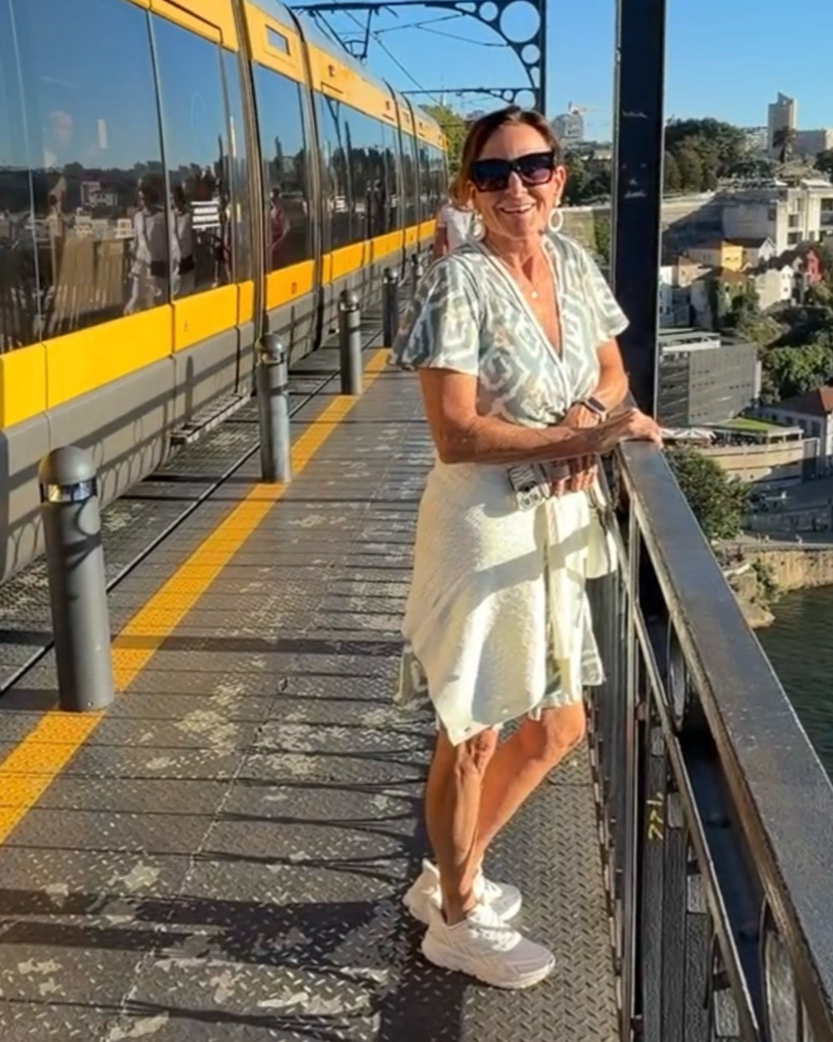 Portugal Sightseeing Outfit: Dress + Sneakers

Exploring Porto in a printed dress and white sneakers—one of my favorite combinations for sightseeing. I tied a light sweater around my waist to have a layer ready for cooler evenings while keeping the look simple and polished.

#travelstyle #fashionover50 #vacationoutfits #dressandsneakers #portugalstyle

#LTKTravel