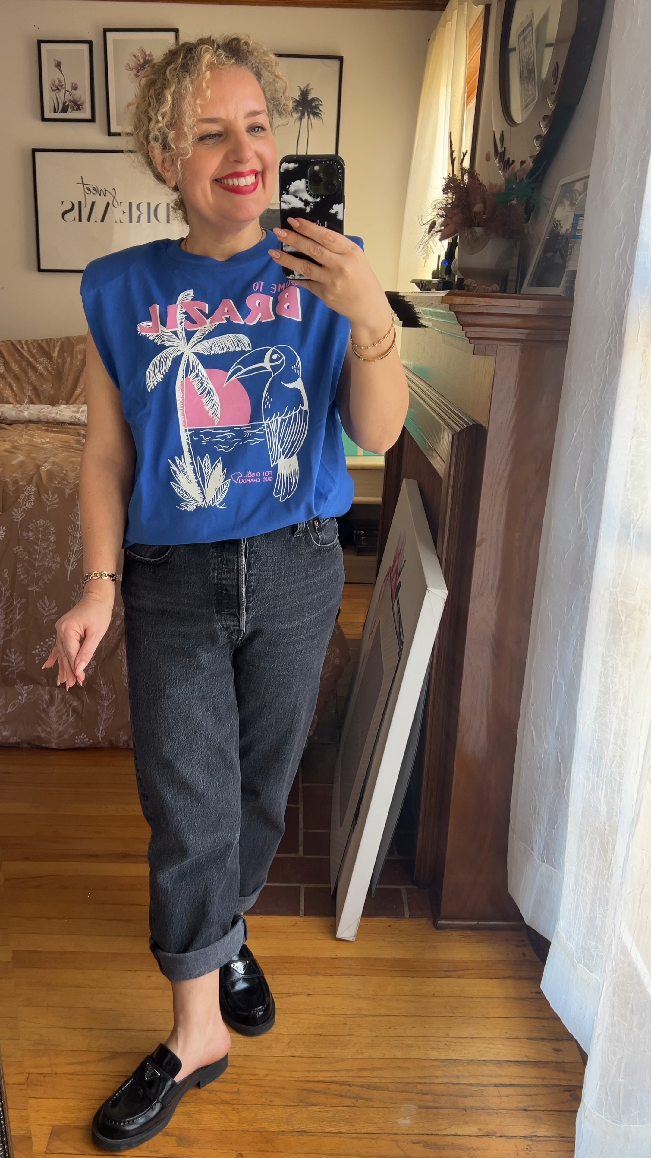 Channeling 80s vibes with muscle tee and rolled-up Levi's jeans – the ultimate vacation outfit for laid-back resort days. Comfort meets style effortlessly. #VacationOutfit #ResortOutfit 

 Wearing size Small in the top and fits TTS. on sale rn at Anthropologie. 

Wearing size 29 in the jeans and fits TTS. On sale rn at Anthropologie and Levi’s. I linked both  

The shoes are Prada slides for that effortless look 




#LTKSpringSale #LTKsalealert #LTKVideo