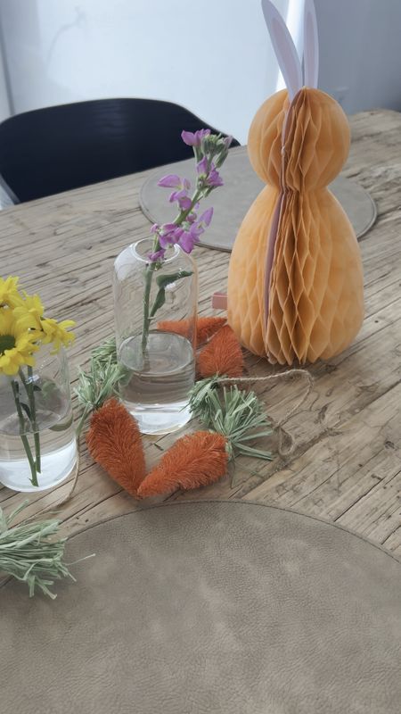 Simple Easter/Spring table center piece. 🐰 I’m eating to add the flower shape placemats so bad! 🌸 

#centerpiece #easter #carrotgarland #easterbunny 

#LTKstyletip #LTKSeasonal #LTKhome