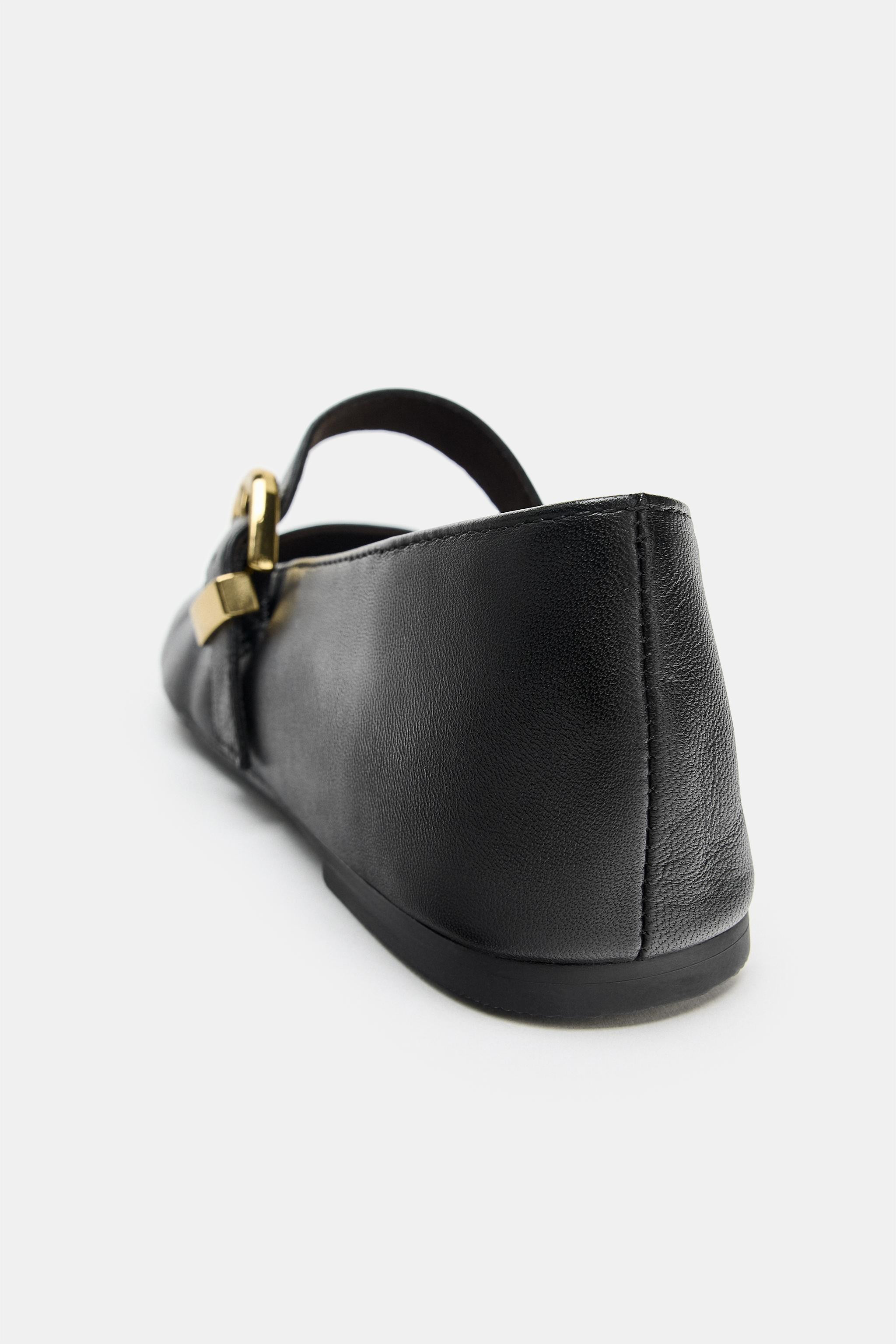 Leather ballet flats. Front strap with adjustable metal buckle. Rounded toe.Sole height: 0.4 inch... | Zara US