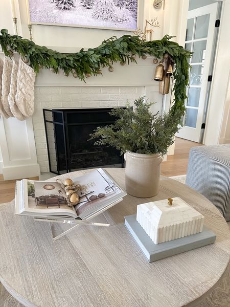 Neutral, holiday, coffee table decor. A floral vase. Target cedar branches. Decor box. Home decor styling. Acrylic book display. Amazon Home finds. Target finds. Studio McGee. round coffee table.

#LTKhome #LTKHoliday #LTKSeasonal