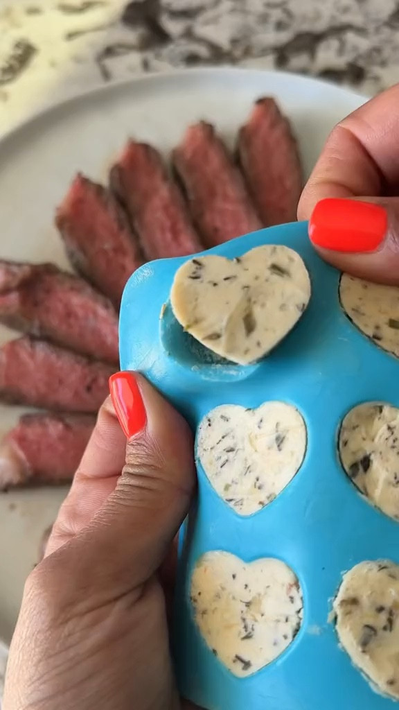 Embracing the magic of the little things tonight! While the world outside may be bustling, there's something extraordinary about finding joy in simplicity. 🌈 That is why we are staying in, and I am cooking up some ribeyes for dinner. 🍽️ Just because we're at home doesn't mean we can't indulge in a gourmet experience!
Grab Yours Here: https://amzn.to/490tk0w

But here's the whimsical twist – I'm going to show how much I love everyone by topping them off with adorable herb-infused butter. 🌿💕 So easy to make, just spread into the heart mold and freeze. Pull them out and place on top – voila, instant charm added to your meal! 💫 And did I mention, perfect for date night? 🥂✨

Tonight, let's celebrate the joy found in the details, like the sizzle of a perfectly seared steak and the delightful swirl of herb-infused butter melting over it. 🎉💖 These little touches remind us that happiness can be as simple as a well-cooked meal shared with loved ones. 🥩🌹 Here's to creating magical moments at home! 🏡✨ #ValentinesDayChallenge #valentinesday2024 #steakdinner #itsthelittlethings #homecooking #datenightideas #infused #butter 

#LTKhome #LTKVideo #LTKMostLoved
