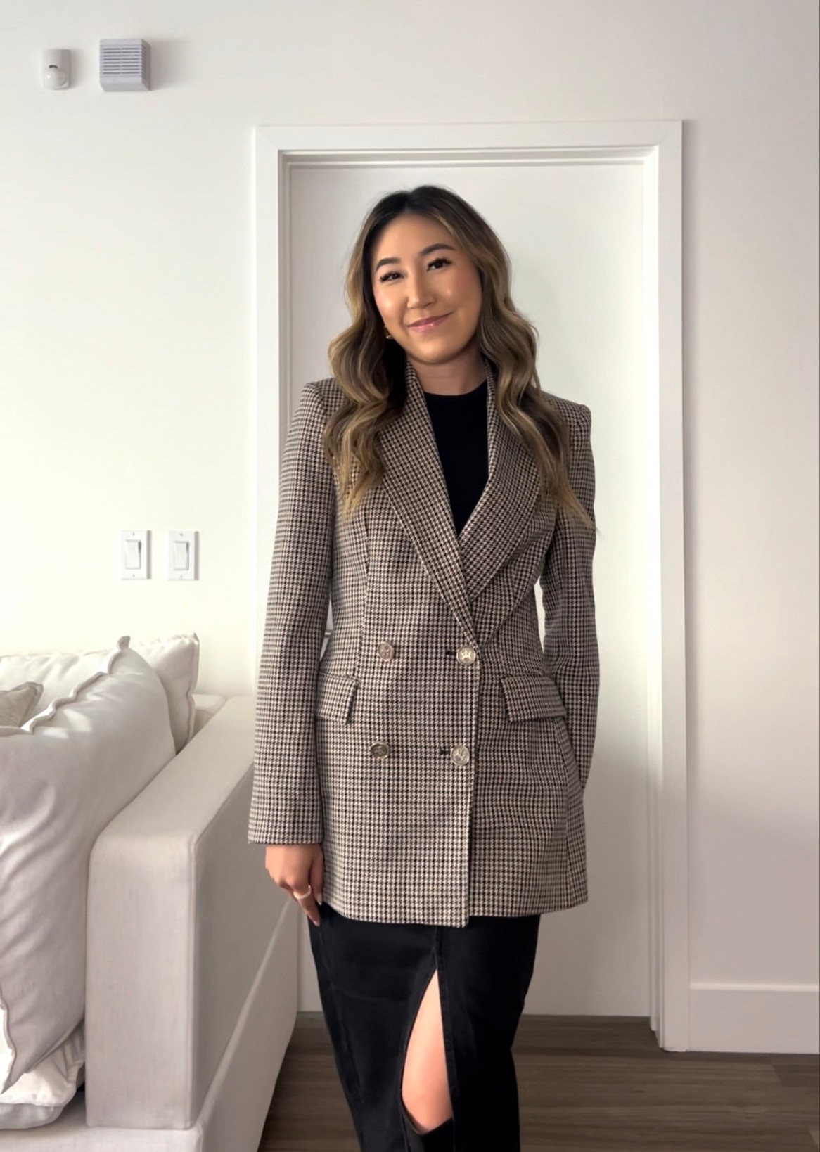 Easy transitional work outfit perfect for those in between days. This checkered blazer is so classic and elevates any look! I threw it on over a monochrome outfit: black tee, black split denim midi skirt, and knee high boots. Great for day to night! 

#LTKStyleTip #LTKSeasonal #LTKWorkwear