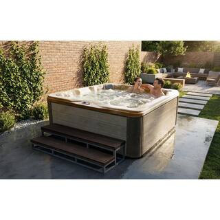 7-Person 56-Jet 240-Volt Premium Acrylic Bench Spa Standard Hot Tub with Bluetooth Sound System and LED Waterfall | The Home Depot