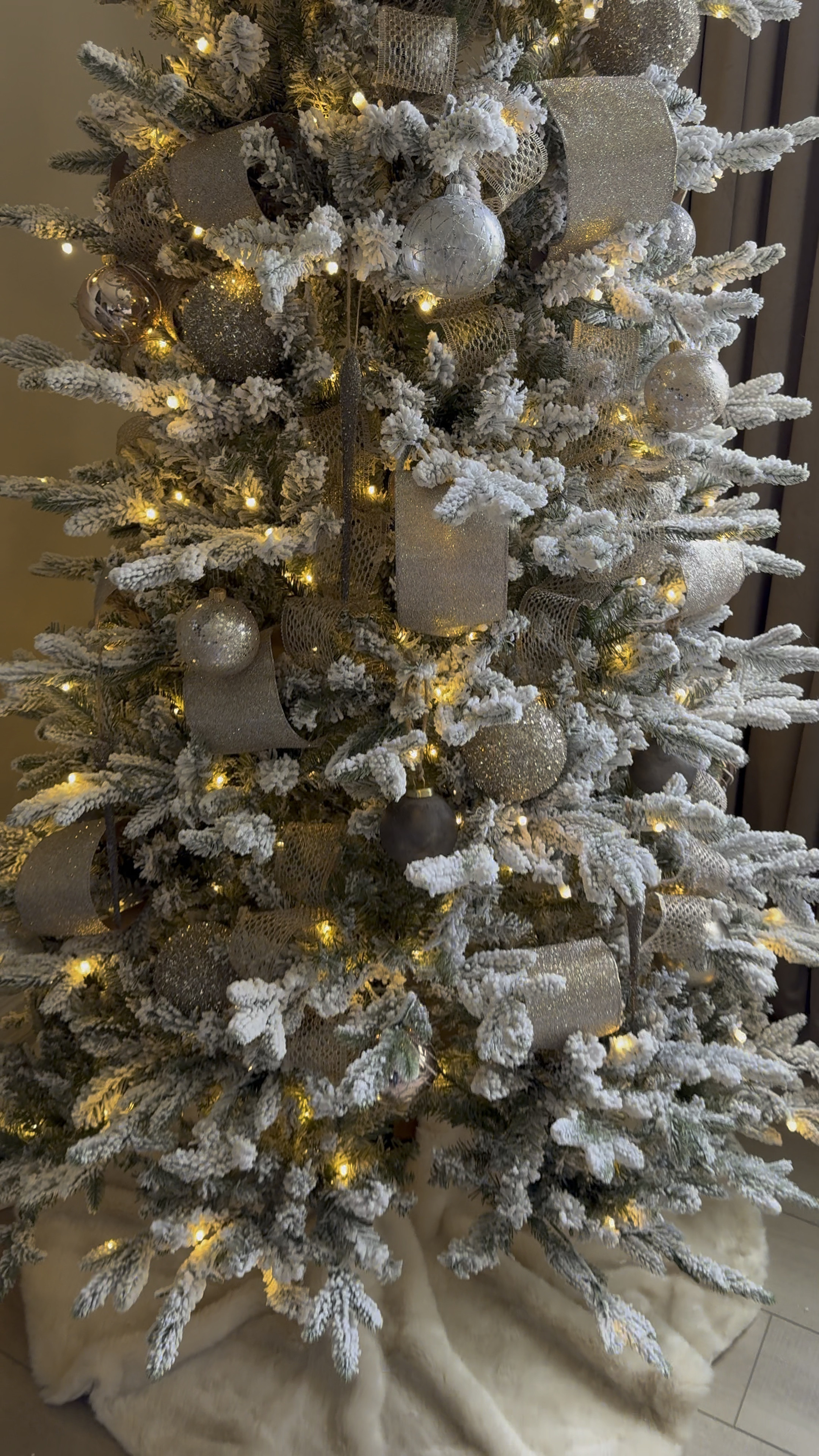 I used leftover ornaments from different trees to create this look for our primary bedroom Christmas tree. I love how it turned out! The best part is the ribbon!

Wired ribbon, Christmas tree, ribbon, gold, ribbon, mesh, wired, ribbon, disco, ball, ornaments, mercury, glass, ornaments, neutral, Christmas tree, faux, fur tree skirt, flocked Christmas tree, king of Christmas tree 

#LTKVideo #LTKhome #LTKHoliday