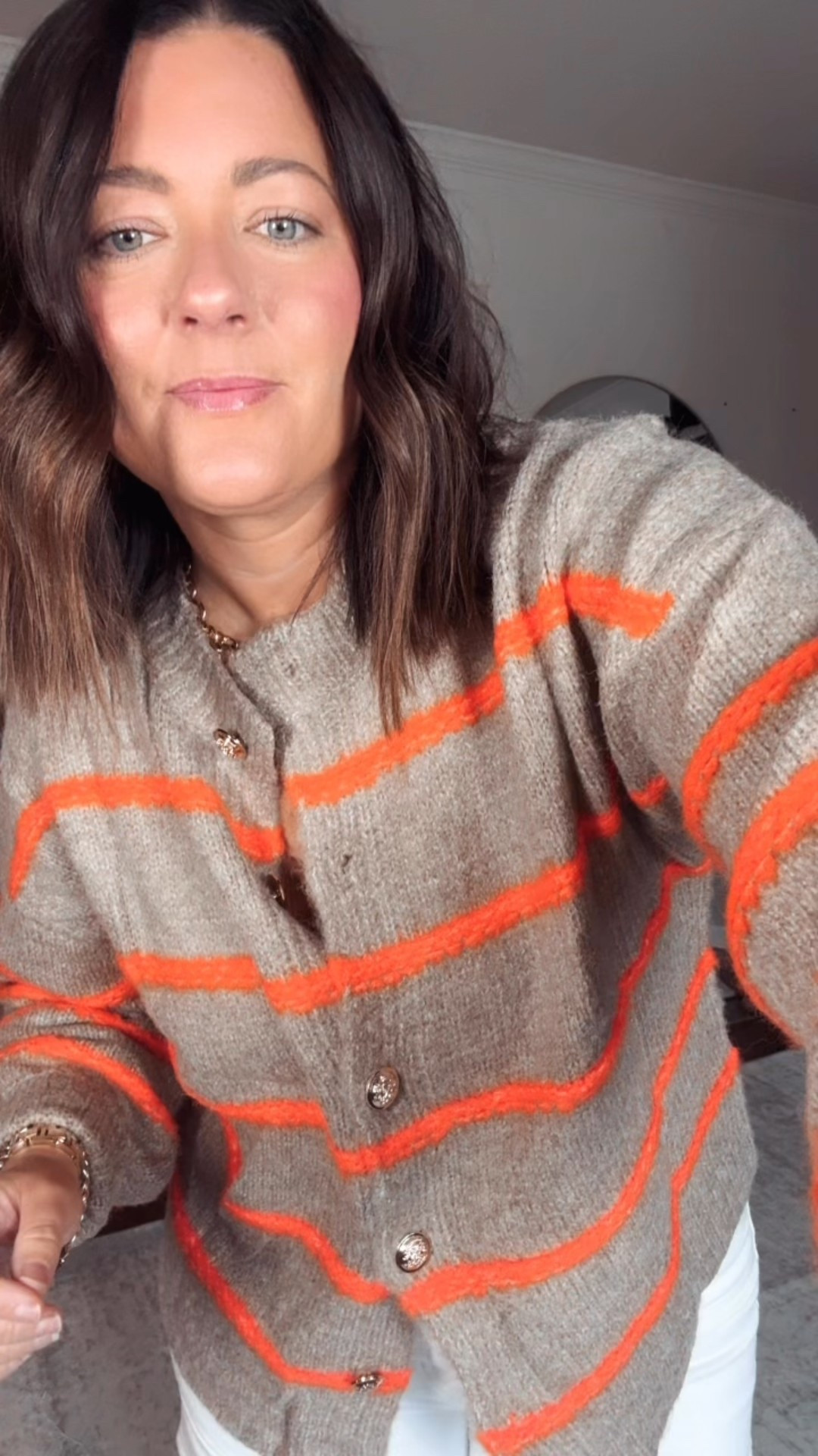 Loving this stripe cardigan! The gold buttons are so pretty! Comes in lots of color options but I am loving this orange and tan 