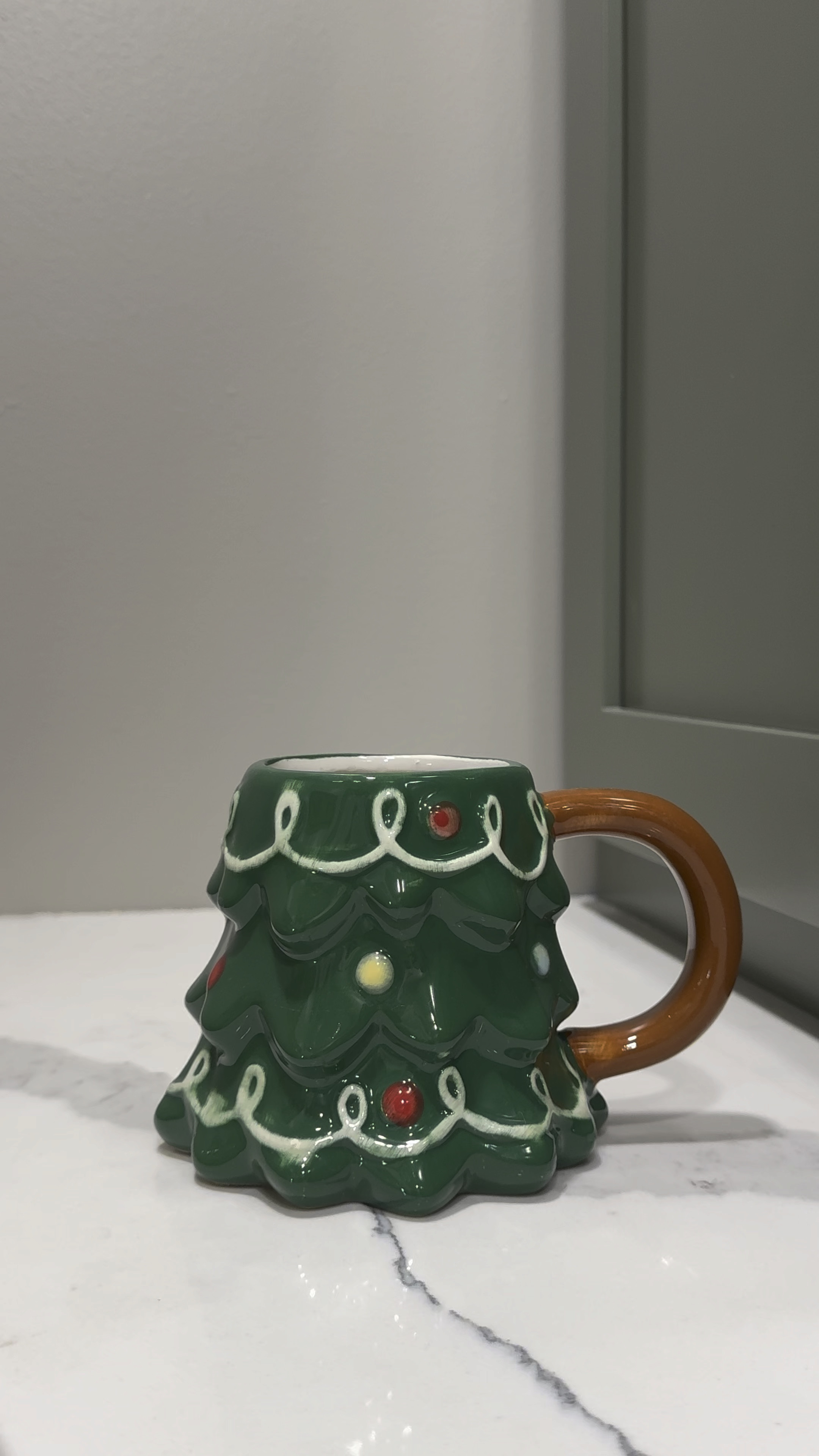 Christmas tree coffee mug from Target! This year they added a candy cane handle! 

#LTKVideo #LTKHome #LTKHoliday