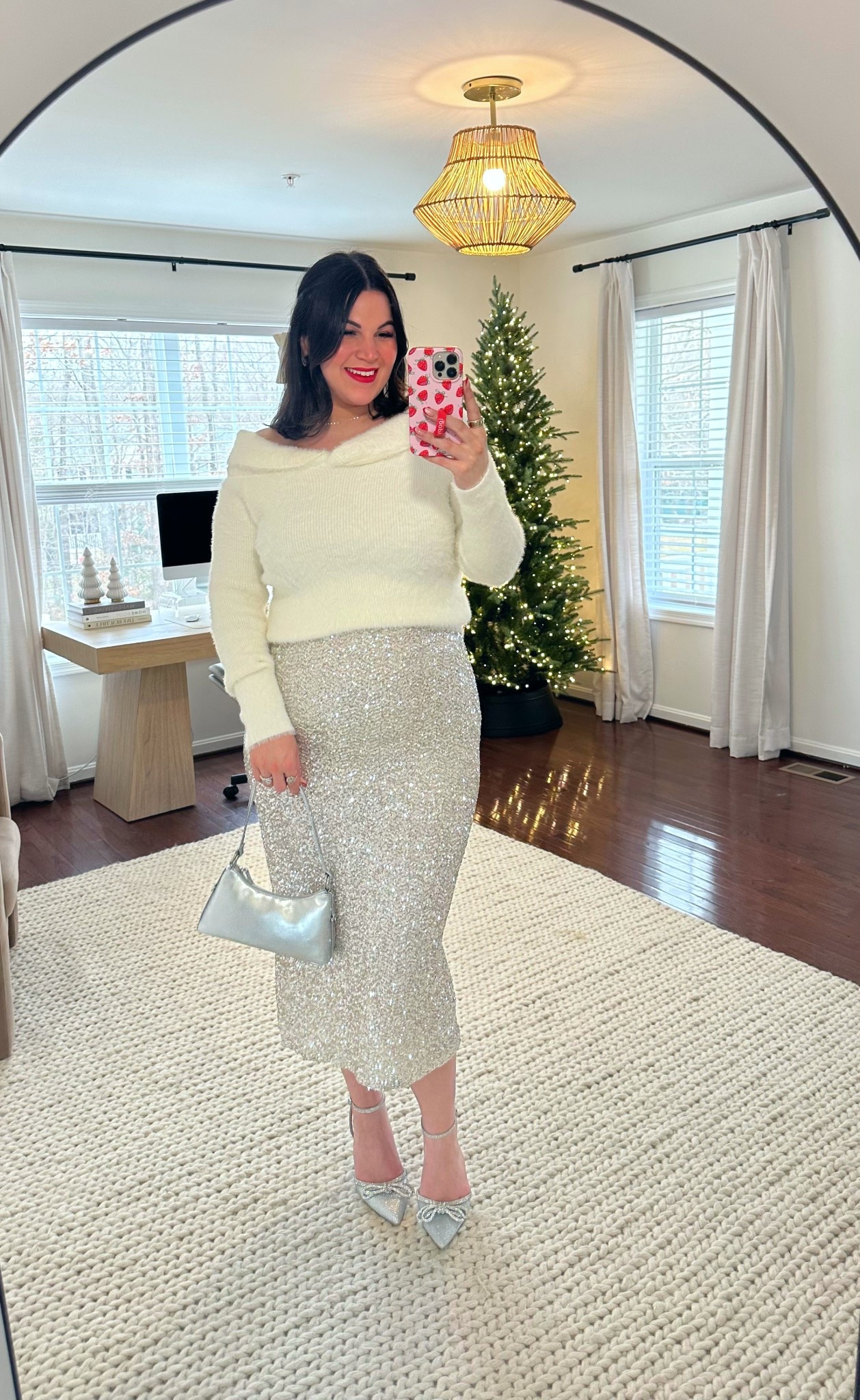Midsize holiday outfit! You went crazy for this sequin skirt in black so naturally I had to grab the silver as well! And it’s just as good!! 😍 styled it with this white fluffy sweater + some silver accesssories to go with the skirt! You can shop both at @shopbalticborn + use my code KELLY15 to save! 

Strapless -  xl *use code KELLYTK20 to save 
Sweater - xl
Skirt - xl
Heels - 9 
*similar bag



#LTKMidsize #LTKHoliday #LTKTall