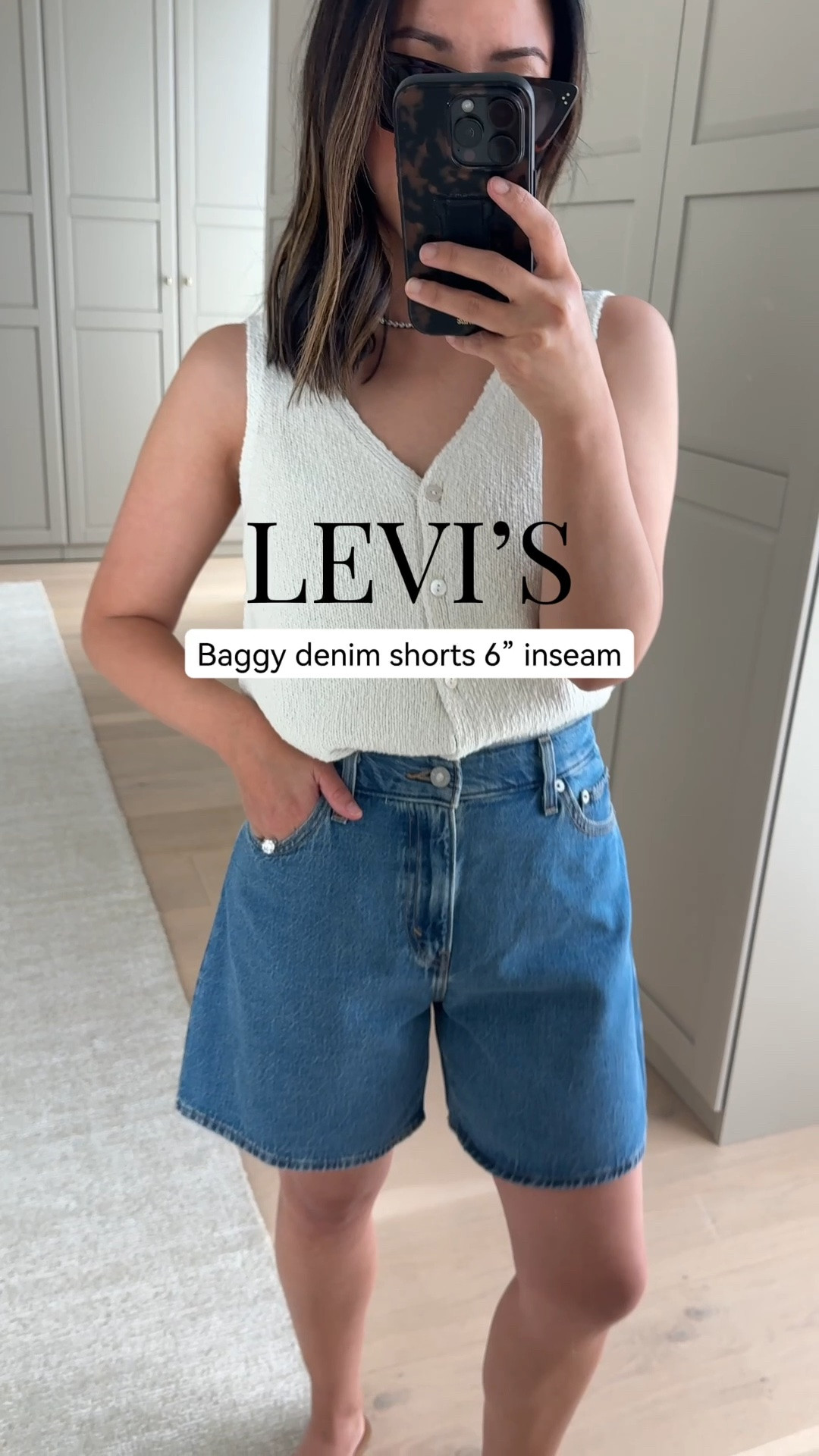 This is such a great longer denim short - 6" inseam, high rise, and the denim is really soft. Love this wash too. Wearing a small in the knit vest and sized up to 26 in the shorts. @levis #LevisLTKPartner

#LTKPetite