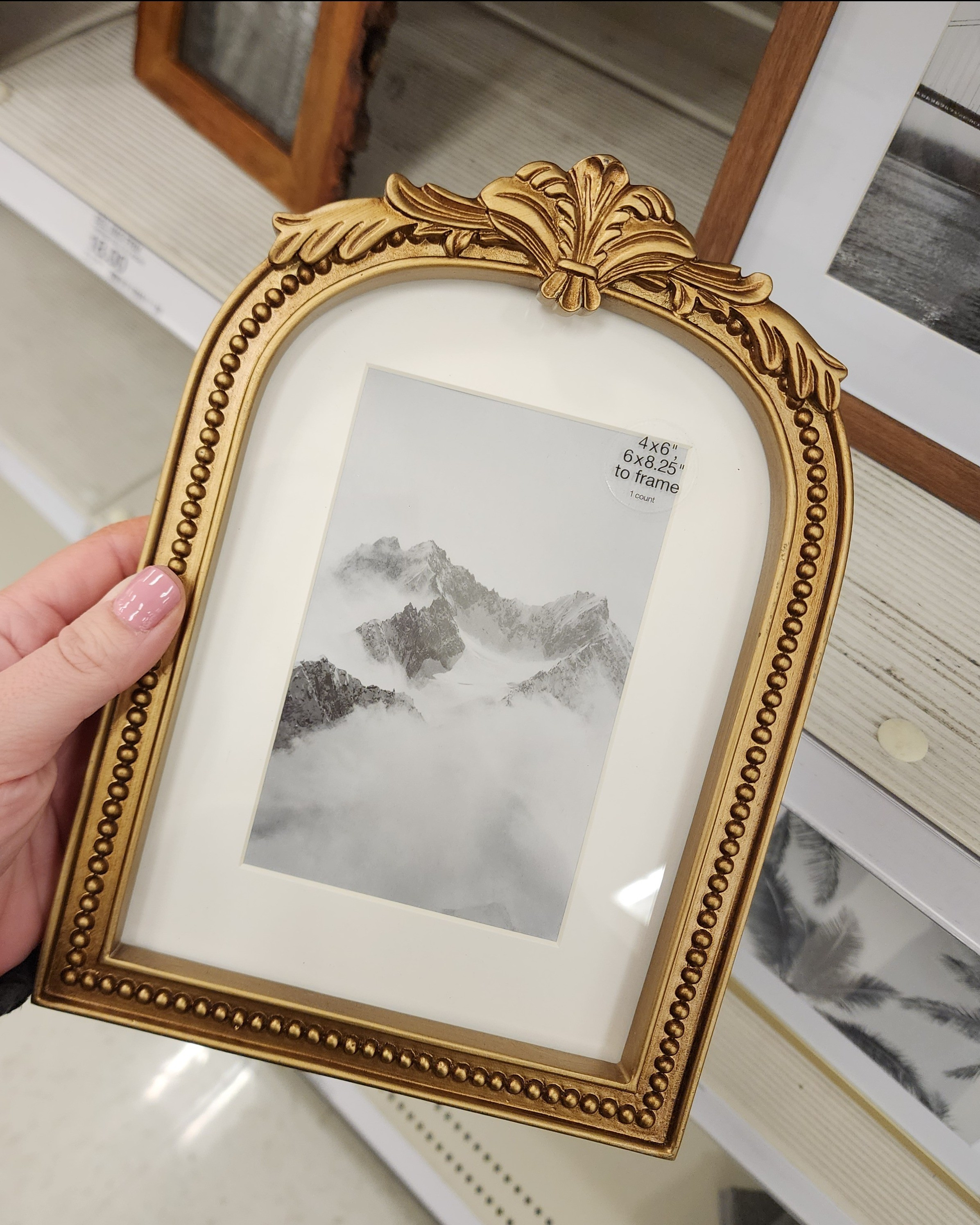 Antique brass frame holds a 5x7 photo. Only $12 at Target! ✨ #targetfinds #targethome #homedecor

#LTKHome #LTKMostLoved #LTKWatchNow