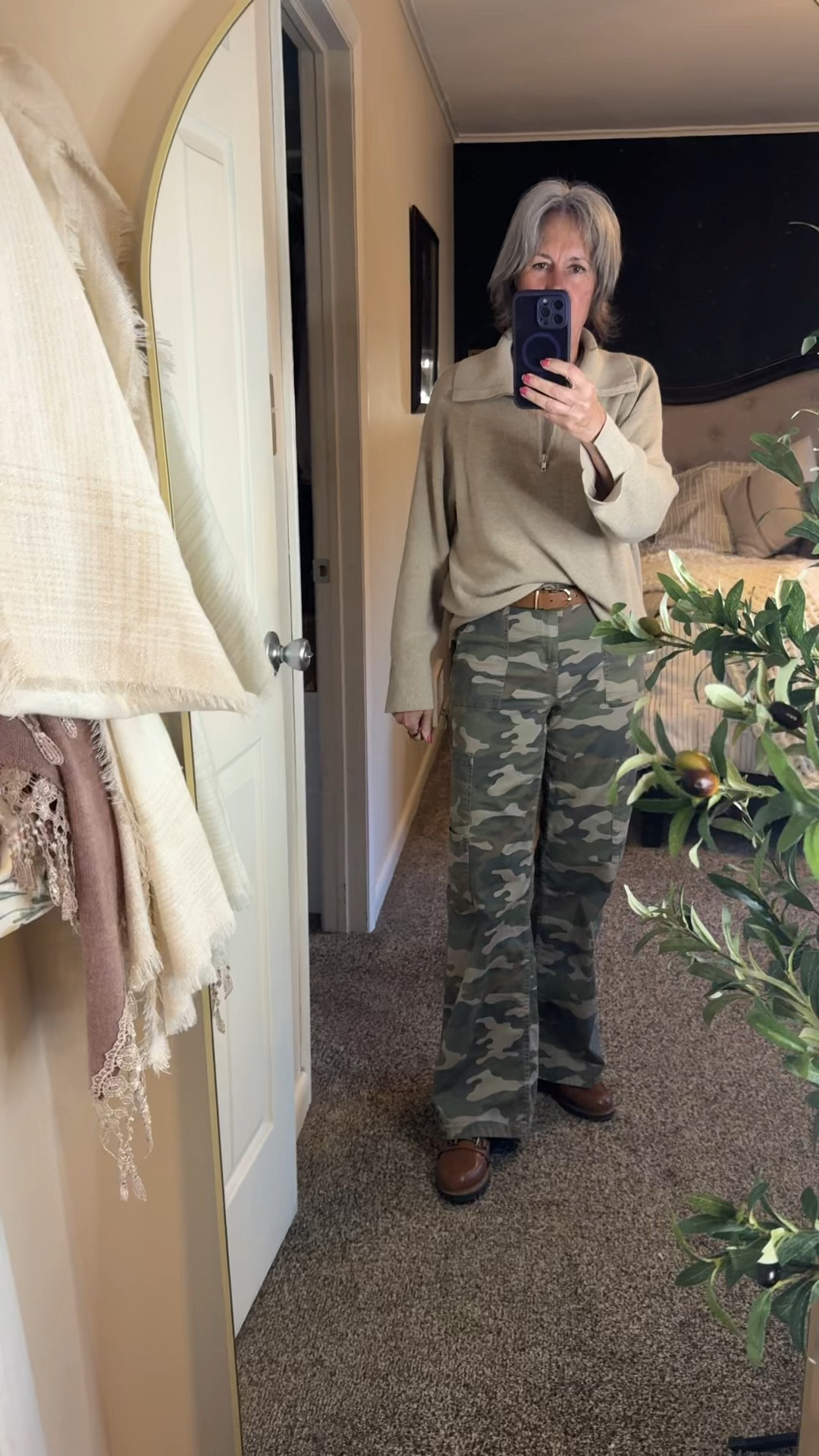 Ootd!  My Walmart camo are my go to on busy days. Plus this comfy slouchy sweater that is loose but looks great !  Sorry for the low lighting today! 

I tagged a few slouchy sweaters for you! I am wearing a small in the sweater and had to size down to an extra small in the camo pants  

#LTKOver40 #LTKSaleAlert #LTKootd