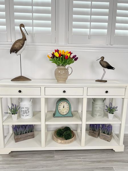 Pretty Wood Birds combined with faux lavender and faux tulips for subtle spring decor! #home #amazon #amazonhome #founditonamazon #springdecor #consoletable #fauxflowers #birds #tulips #springflowers #coastaldecor #farmhousedecor

#LTKhome