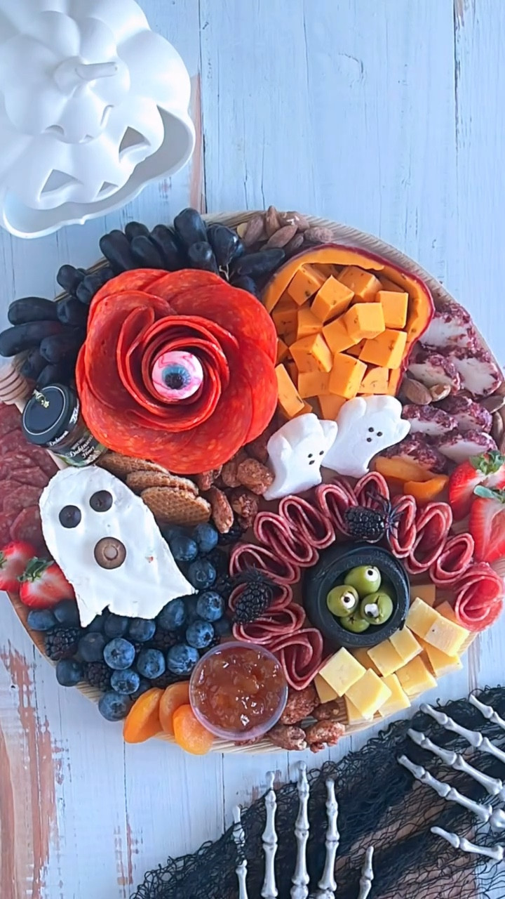 Adding EYEBALLS 👀 to your Halloween boards⬇️⬇️

▪️Olives - Green or black olives with pimentos or stuffed with cheese for a realistic look.
▪️Gummy Eyeballs
▪️Sugar Eyeballs
▪️Peppercorns - Place in the center of small cheeses or olives to mimic pupils.
▪️Mozzarella Balls - Add black olive slices on top to create an edible eyeball.
▪️Radishes - Carve out the center and place a black olive or peppercorn. 

SAVE and FOLLOW @charcuterie_n_things for more food styling tips!

#fyp #charcuterieandthings #charcuterieboard #cheeseboard #foodstyling #diy #halloween #eyeballs #spooky #spookyseason #halloweencharcuterieboard #halloweenfood