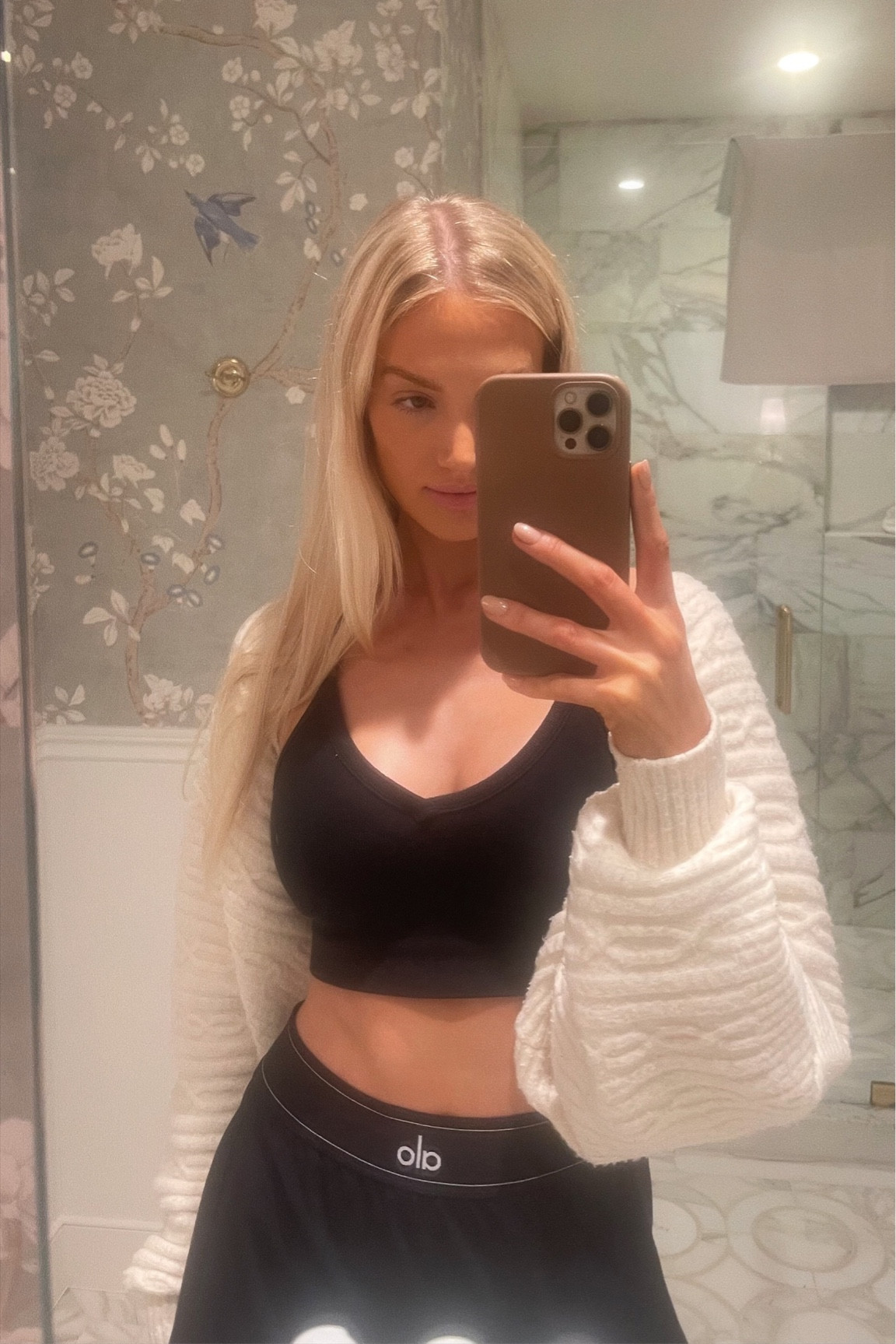 Getting hair and makeup done before the fashion show! Wearing Alo 🖤 Bra and skirt size S. #alo #aloyoga #athlesiure 

#LTKstyletip #LTKfitness #LTKGiftGuide