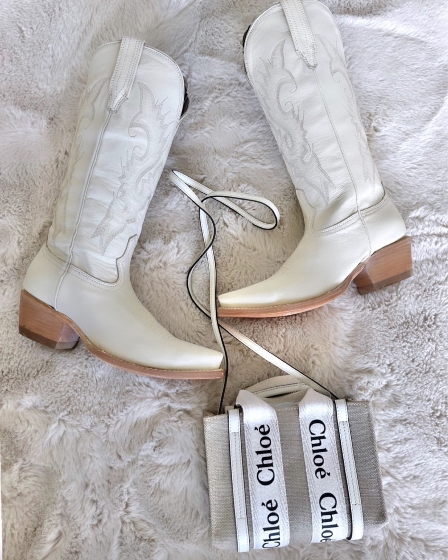 Love these white cowboy boots and my Chloe bag! Country concert outfit essentials 

#LTKOver40 #LTKShoeCrush #LTKStyleTip
