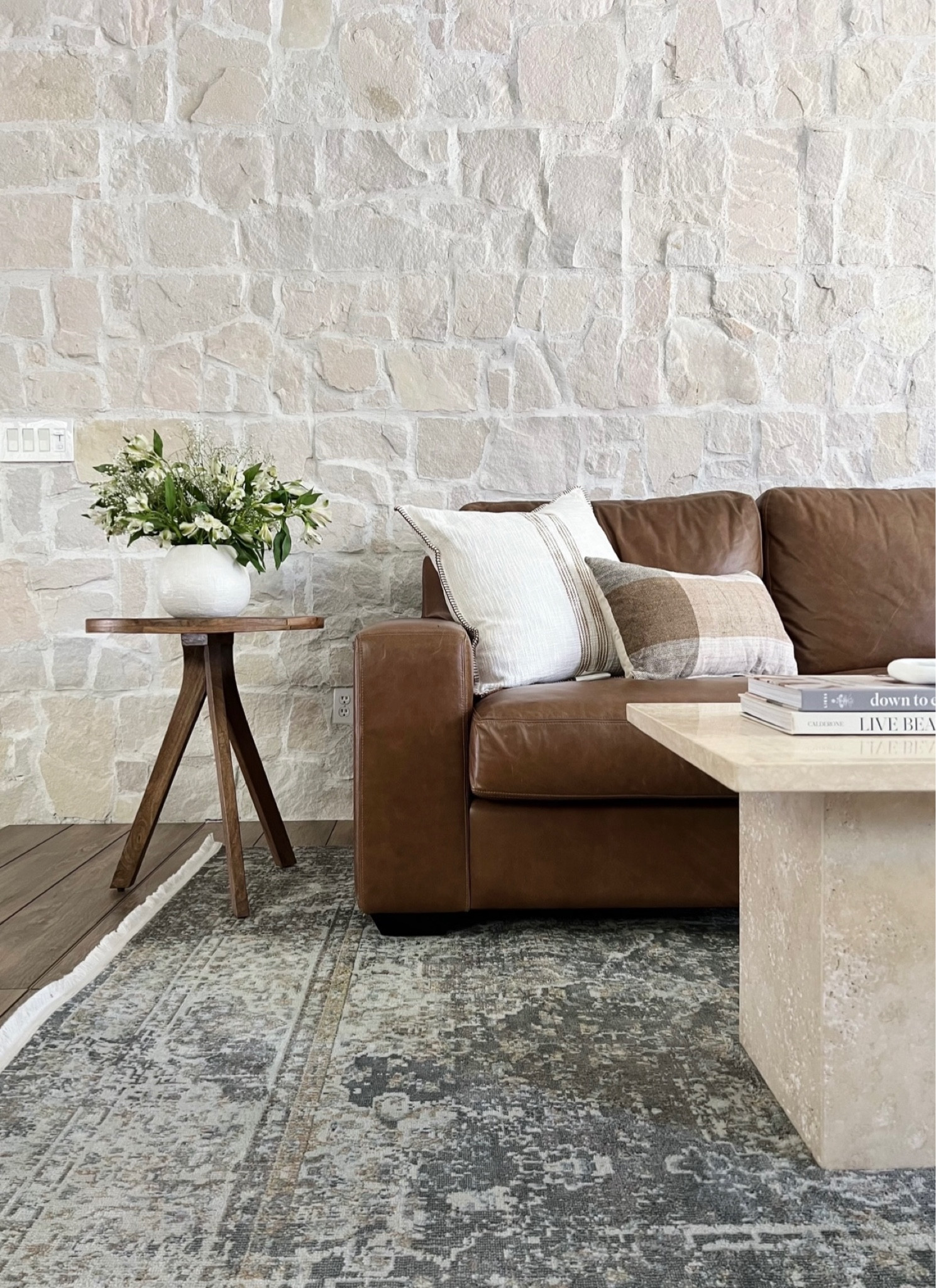 A lot of people ask me about 
1.)  where this stone is from 
and 
2.) where I got this leather couch. 

The stone is actually from floor and decor! And the leather couch is linked below! Follow @brewestberginteriors for me! 

#LTKhome #LTKunder100 #LTKSeasonal