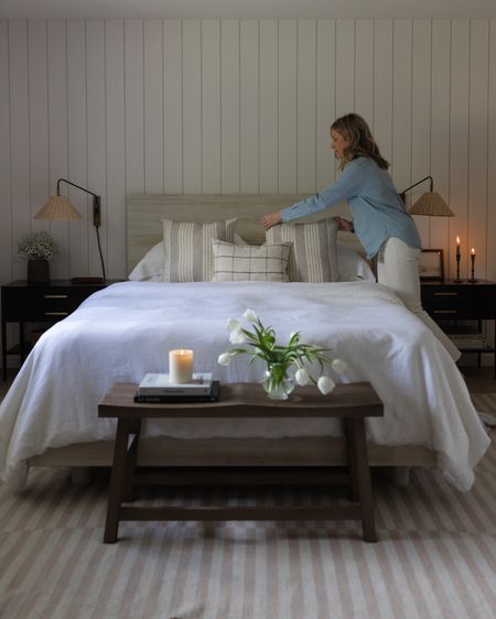 Making the bed in my mom uniform! 

Primary bedroom, chambray shirt, denim shirt, cream denim, white linen bedding, black nightstands, wall sconce, pottery barn, Serena and Lily, west elm, banana republic home, throw pillows, world market bench 

#LTKhome #LTKFind #LTKstyletip