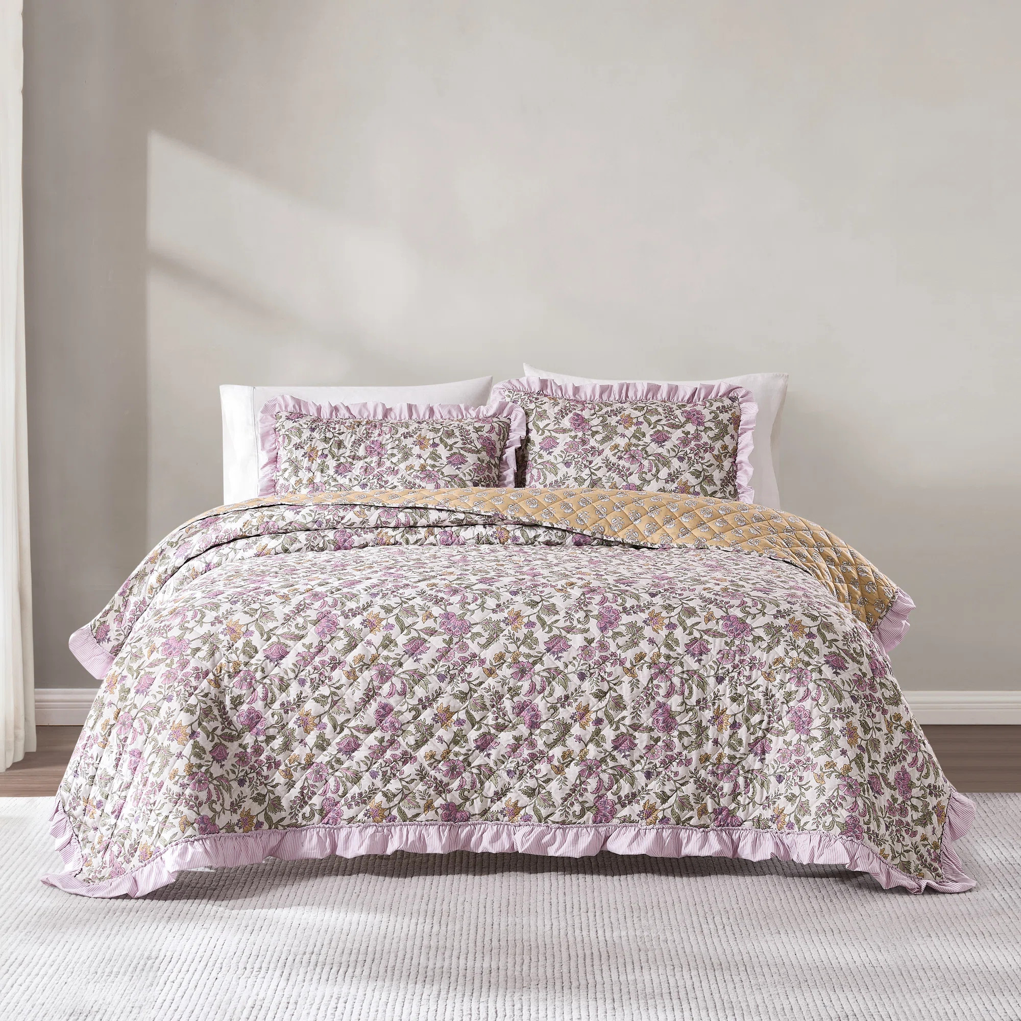 Lola Block Print Ruffle Reversible Floral Quilt Purple/Yellow 3Pc Set | Wayfair North America